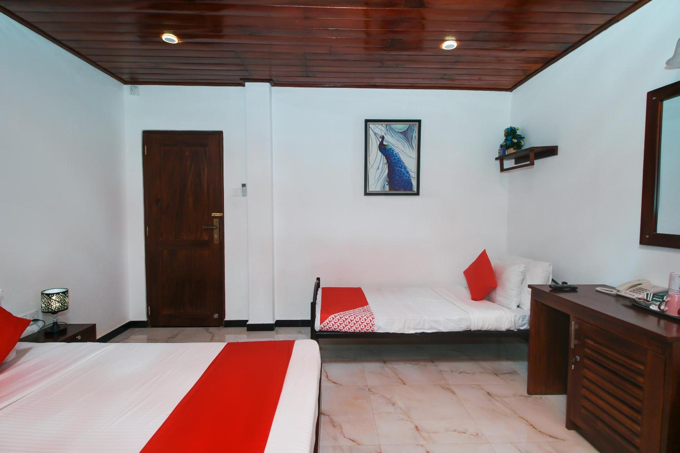 Deluxe Triple Room - Photo 12