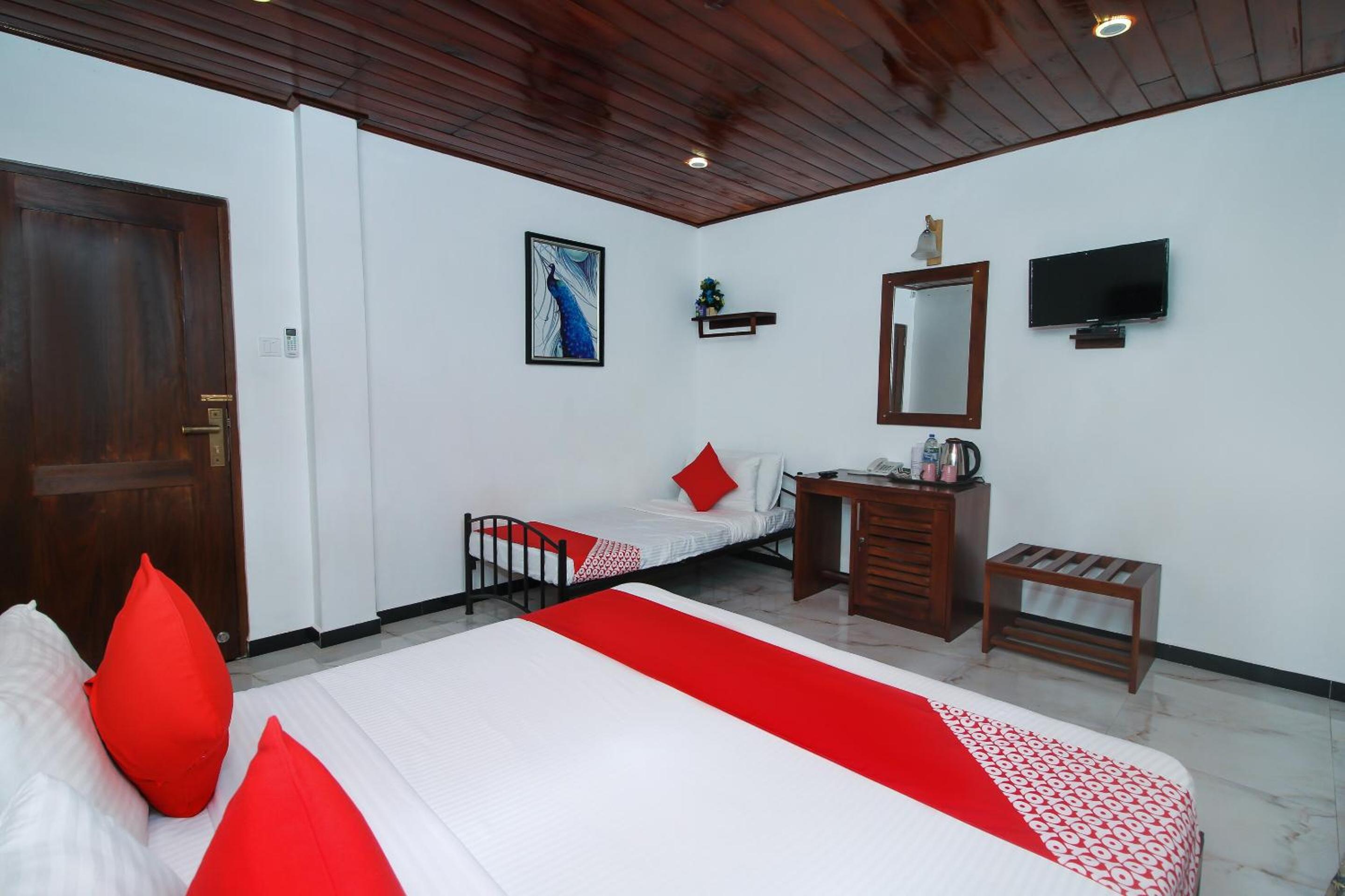 Deluxe Triple Room - Photo 11
