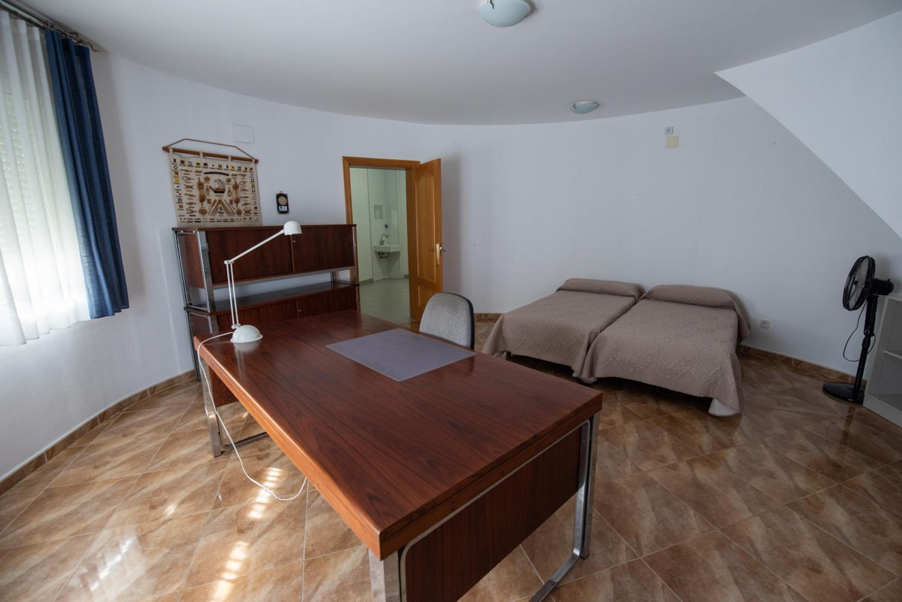 Casa de cuatro habitaciones