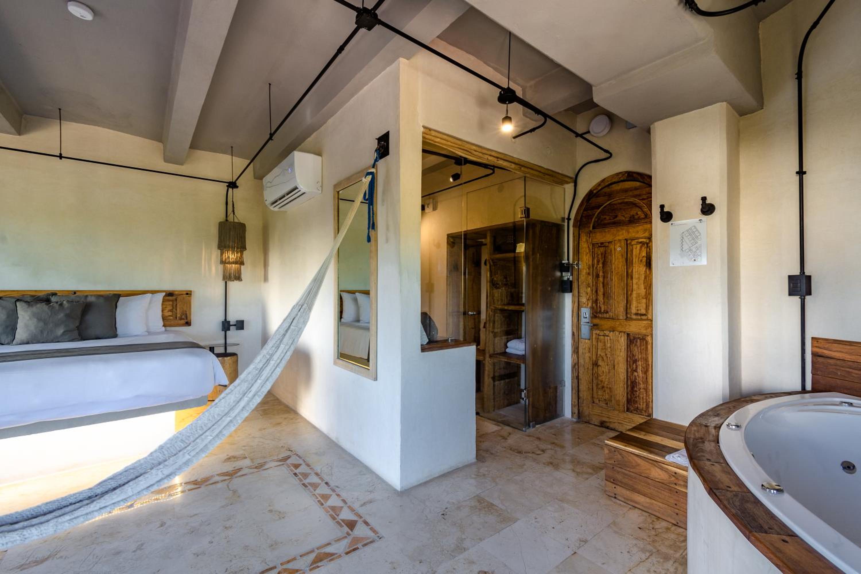 Master Suite with Jacuzzi, Balcony and City Views - Photo 18