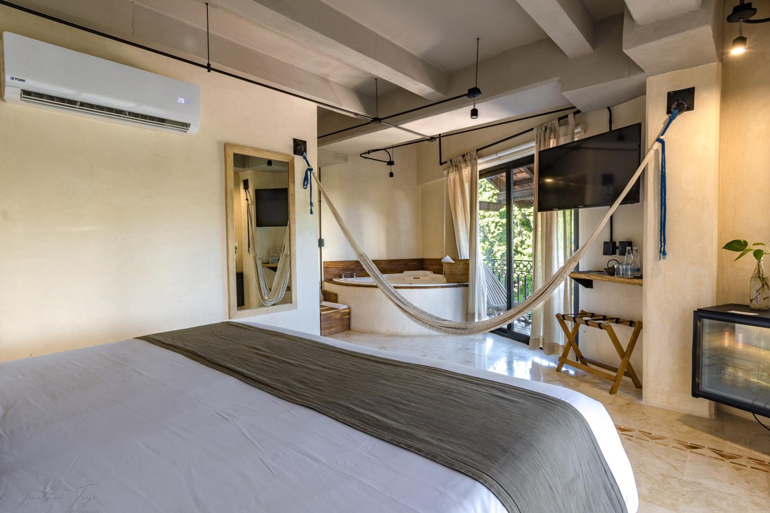 Master Suite with Jacuzzi, Balcony and City Views - Photo 17