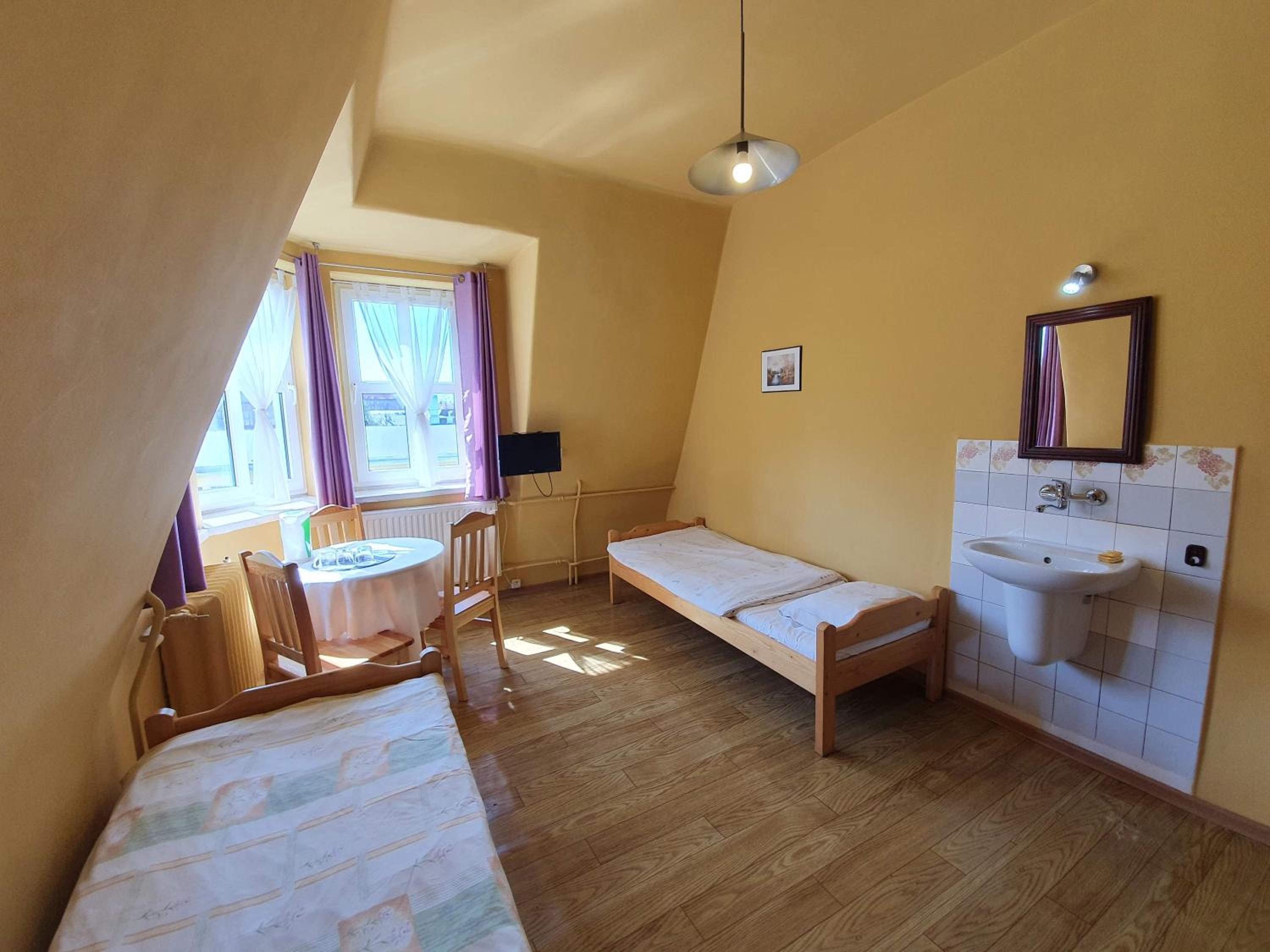 Basic Triple Room with Shared Bathroom