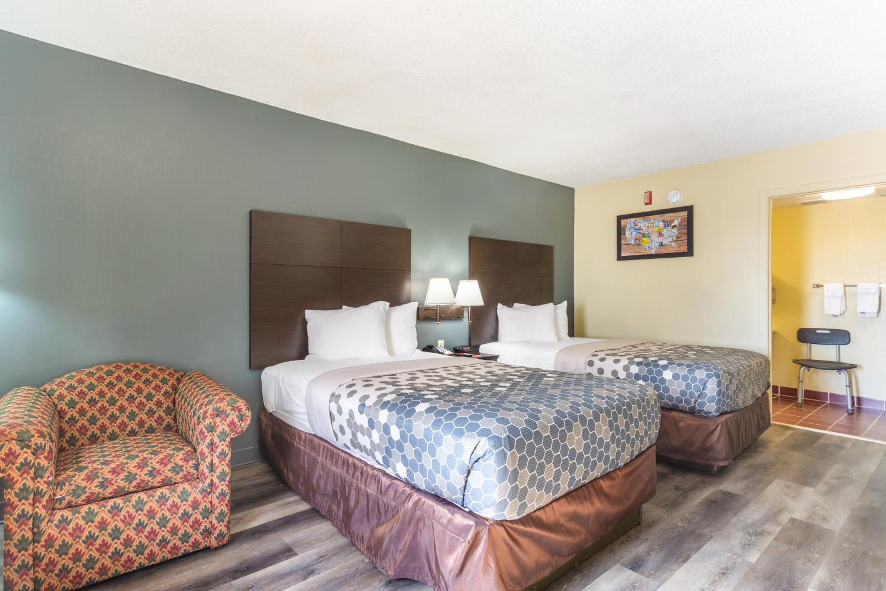 Double Room with Two Double Beds - Accessible/Smoking - Photo 1
