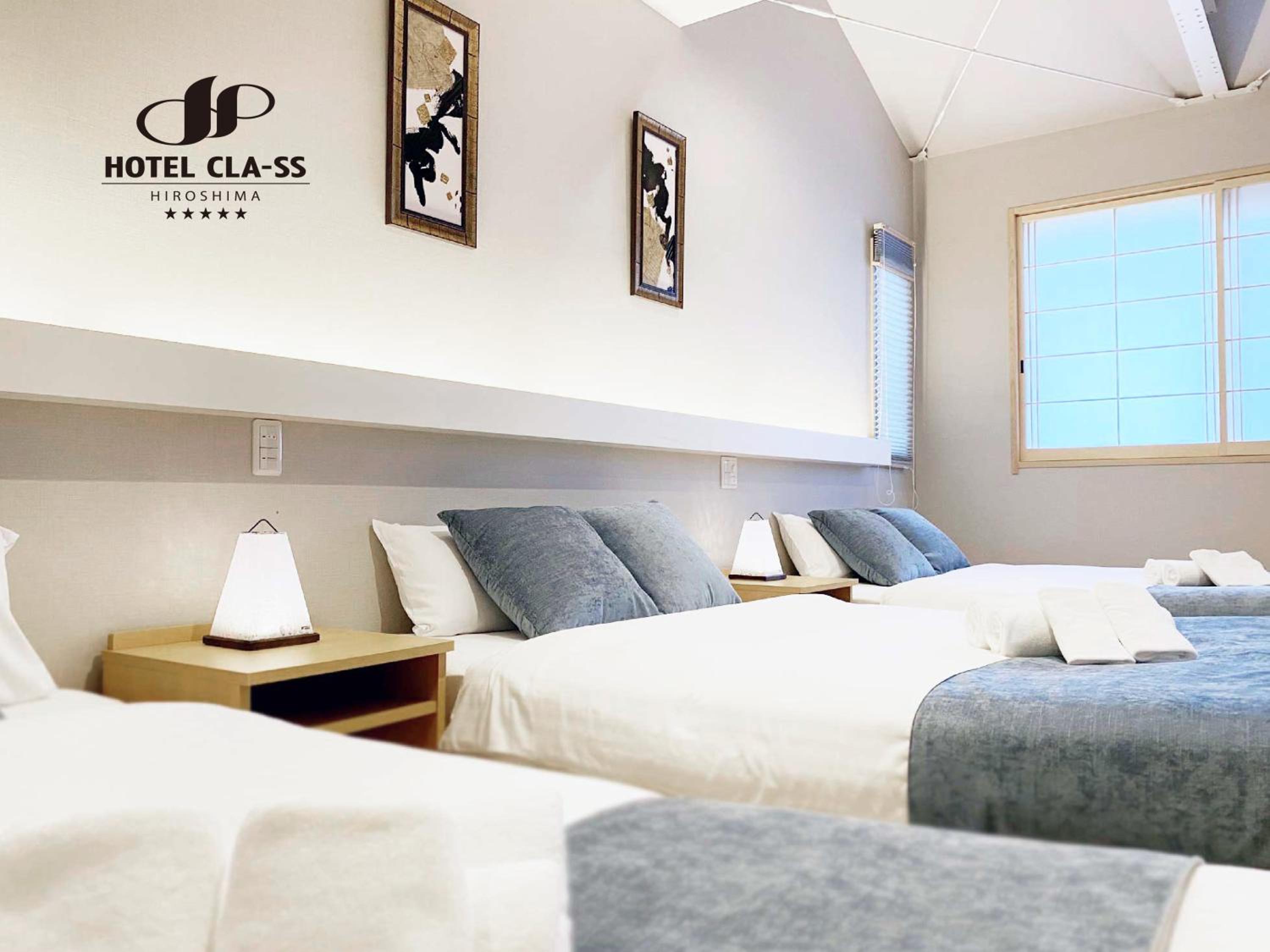 Deluxe Family Suite - Photo 11
