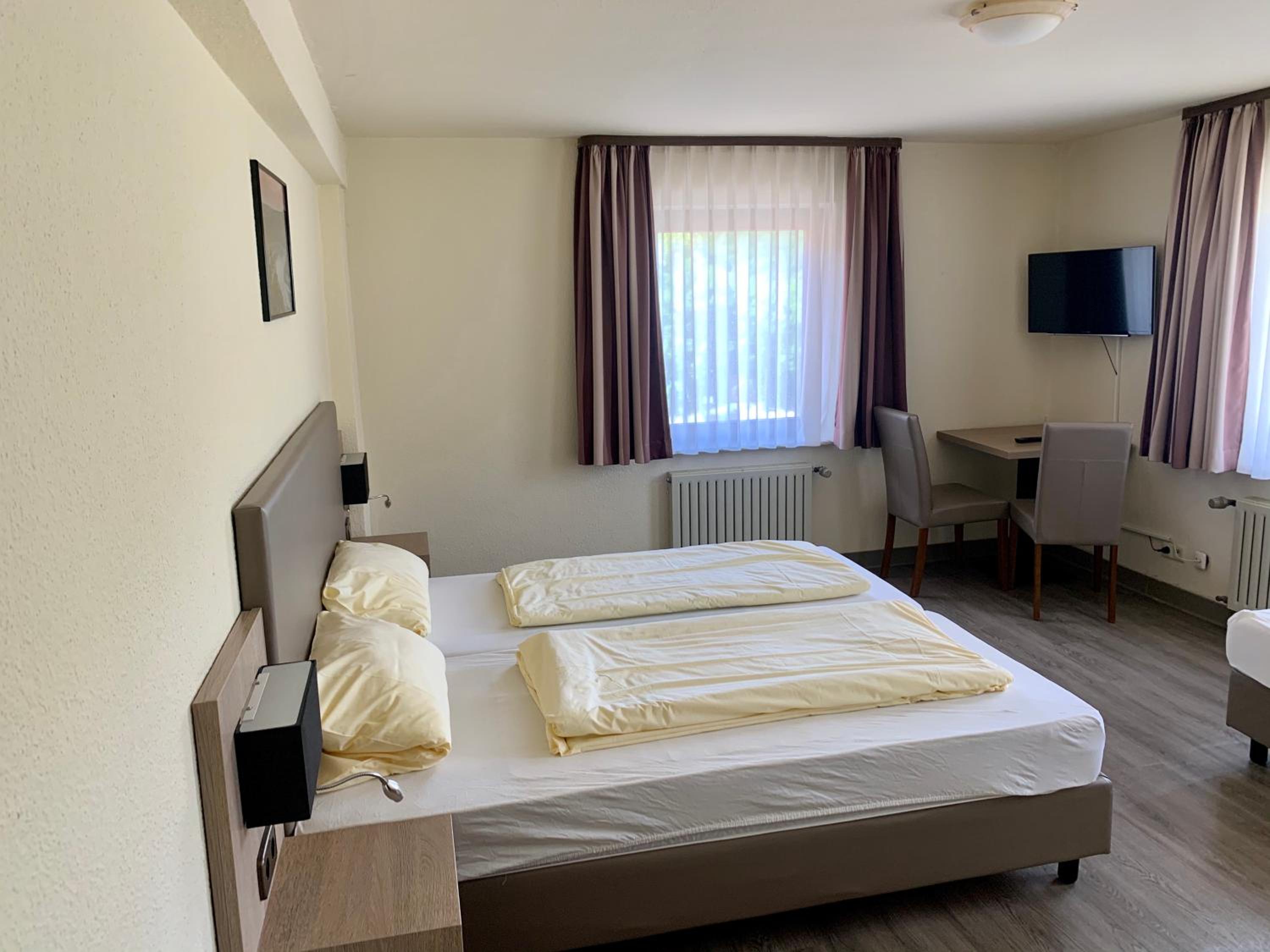 Basic Triple Room photo 2