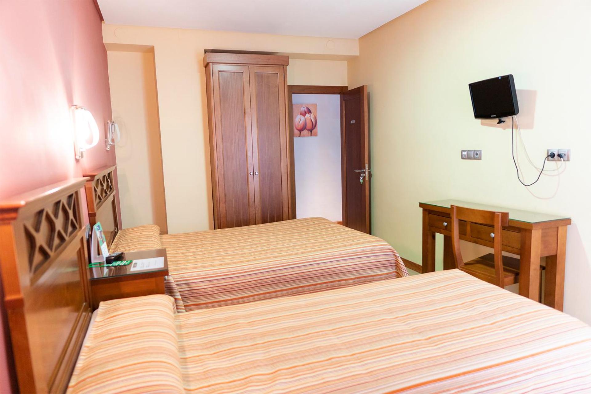 Habitación Triple con Balcón