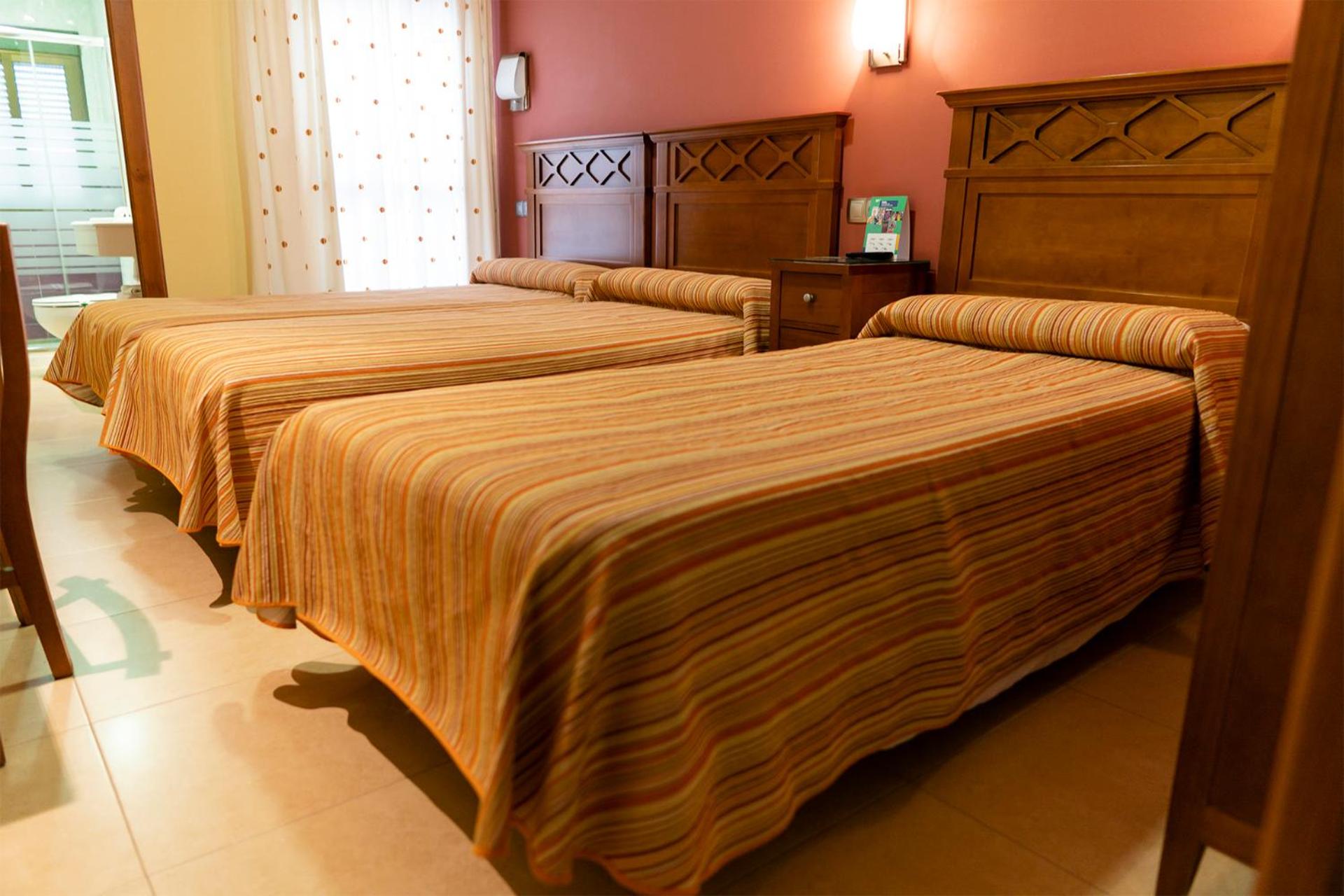 Habitación Triple con Balcón
