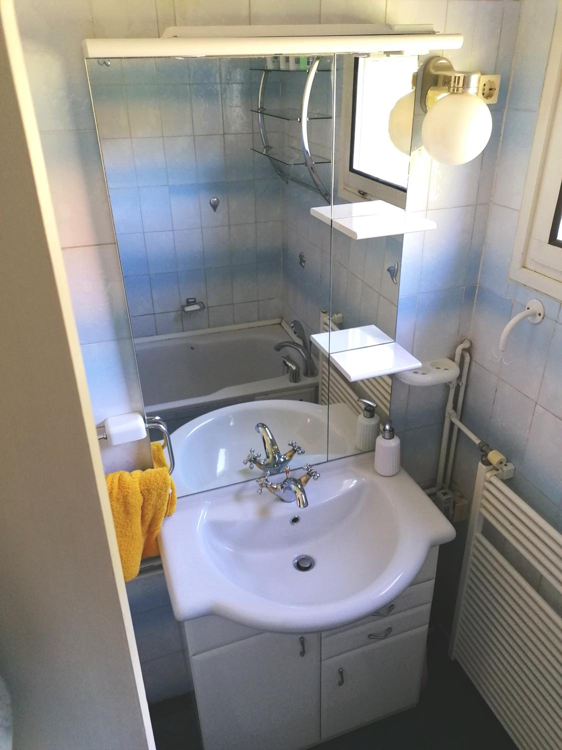 Three-Bedroom House - Photo 19