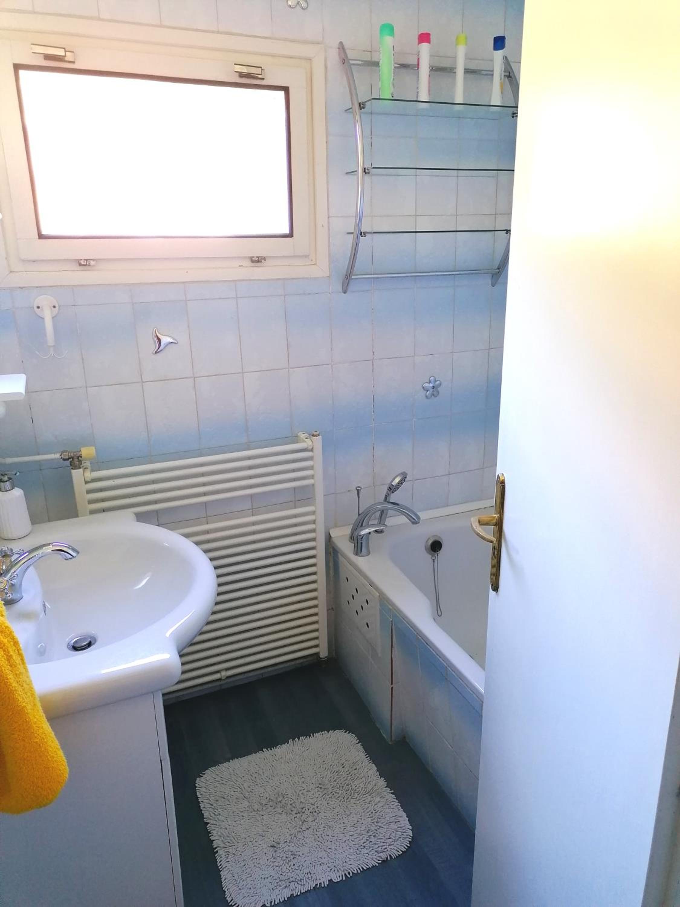 Three-Bedroom House - Photo 16