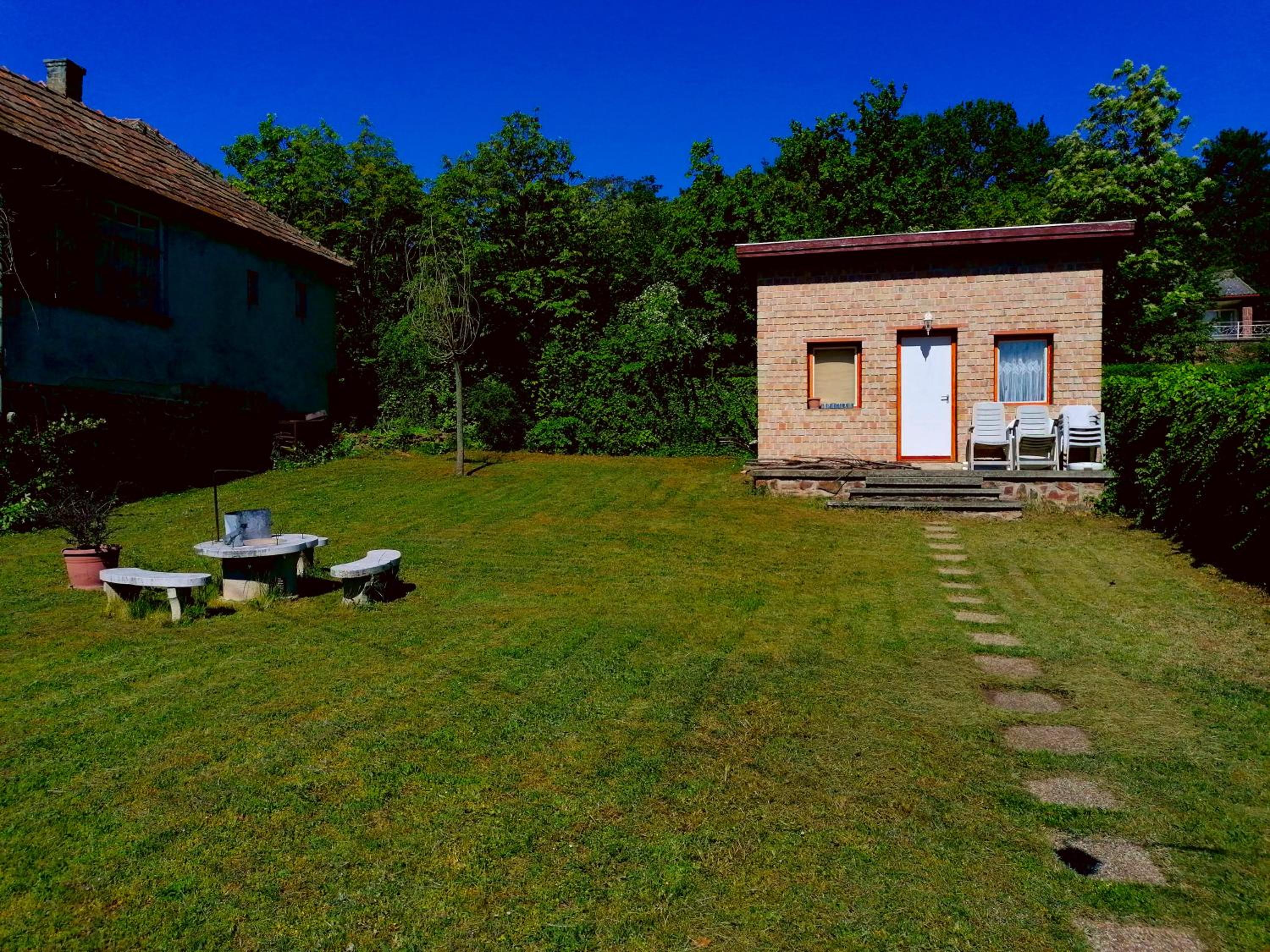 Three-Bedroom House - Photo 2