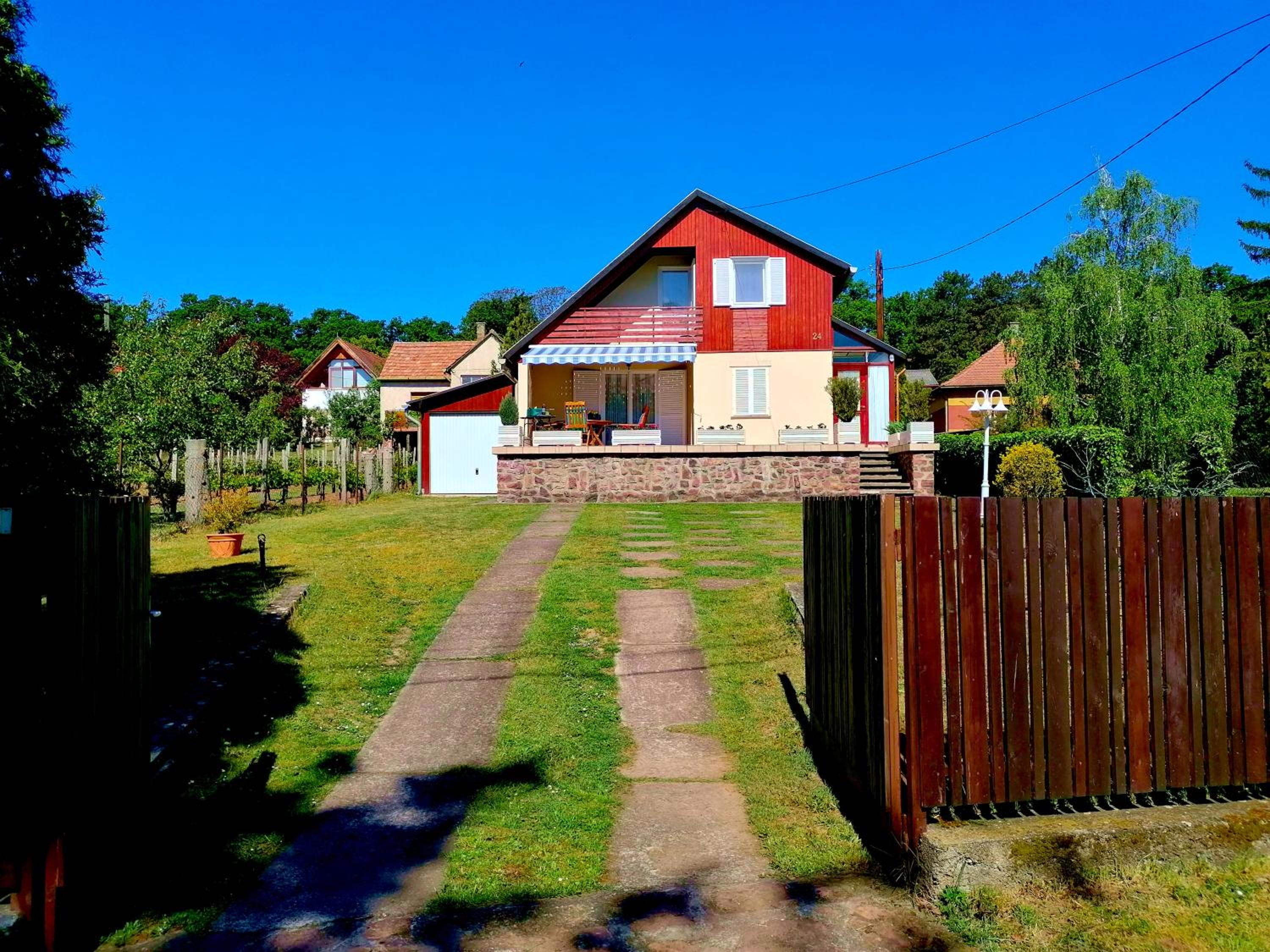 Three-Bedroom House - Photo 24