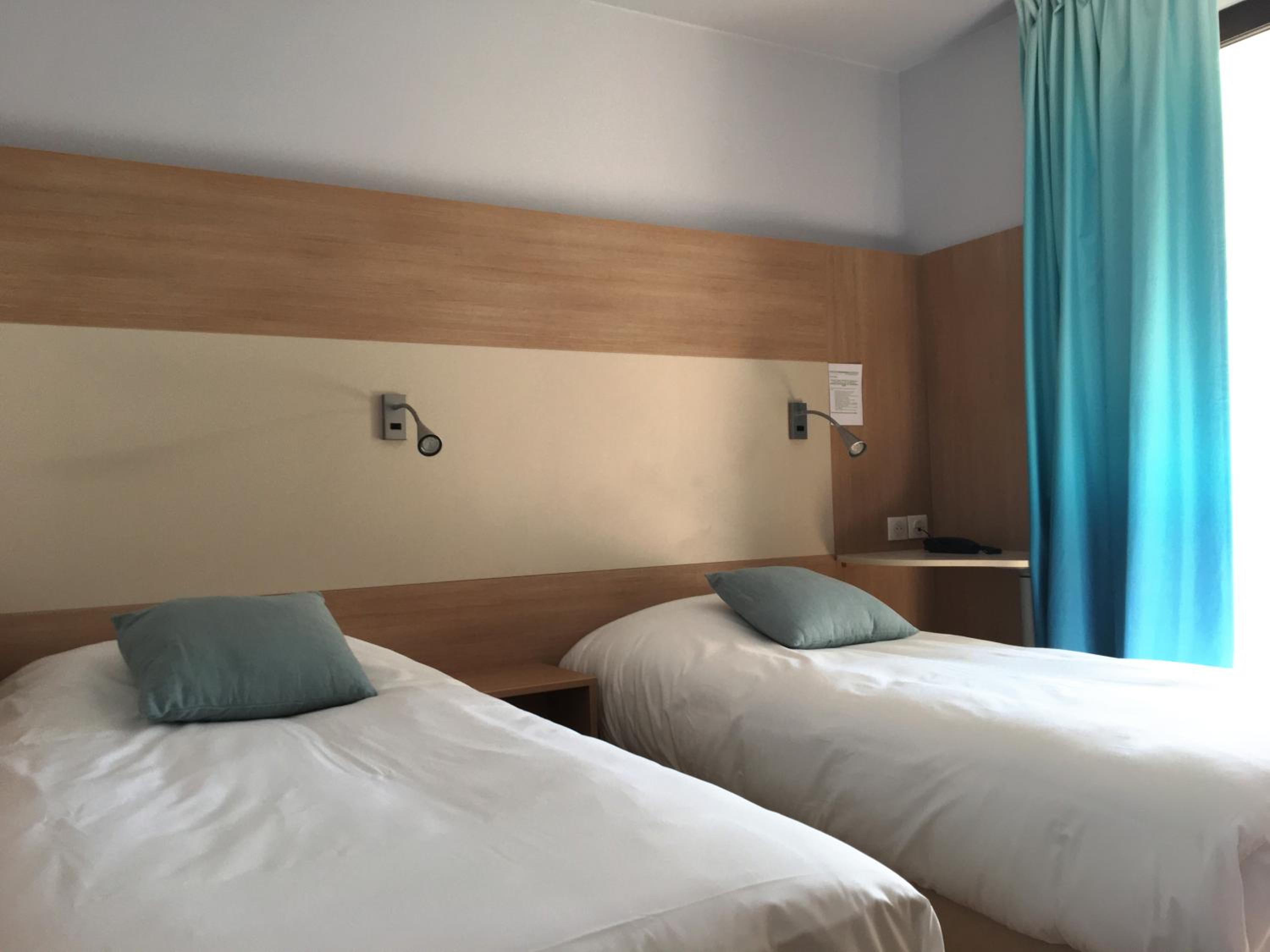 Twin Room - Photo 1