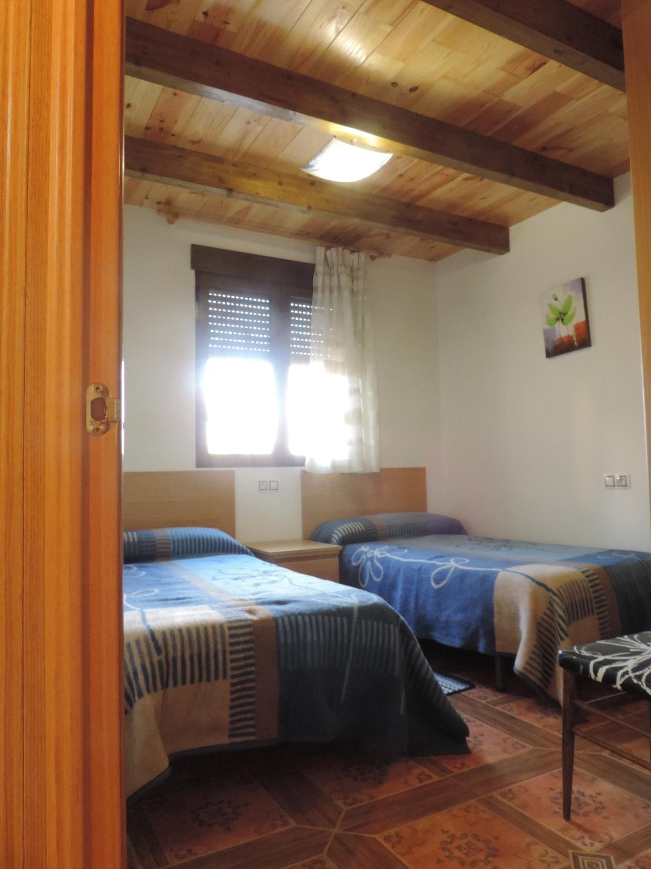 Three-Bedroom House - Photo 22