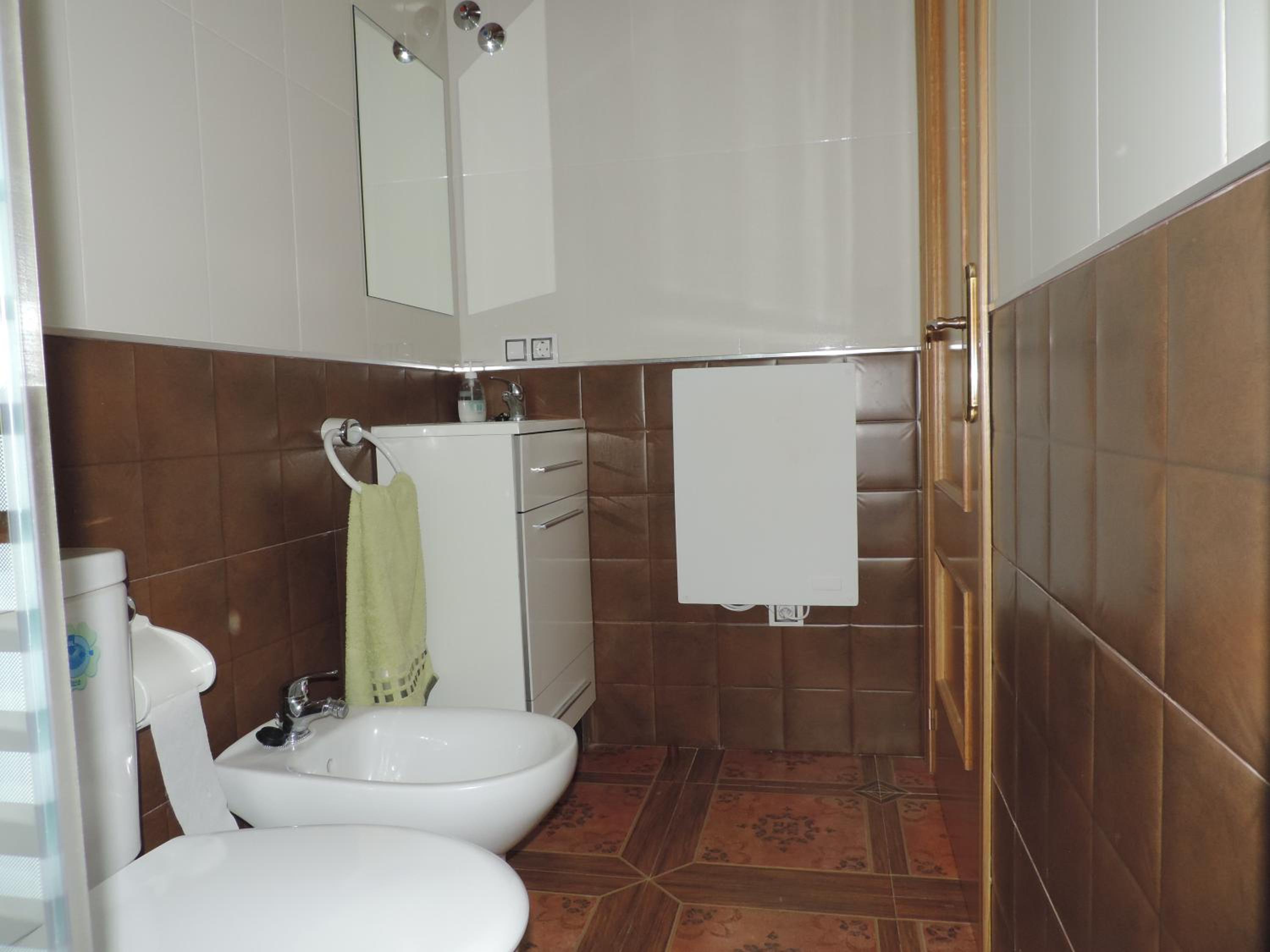 Three-Bedroom House - Photo 15