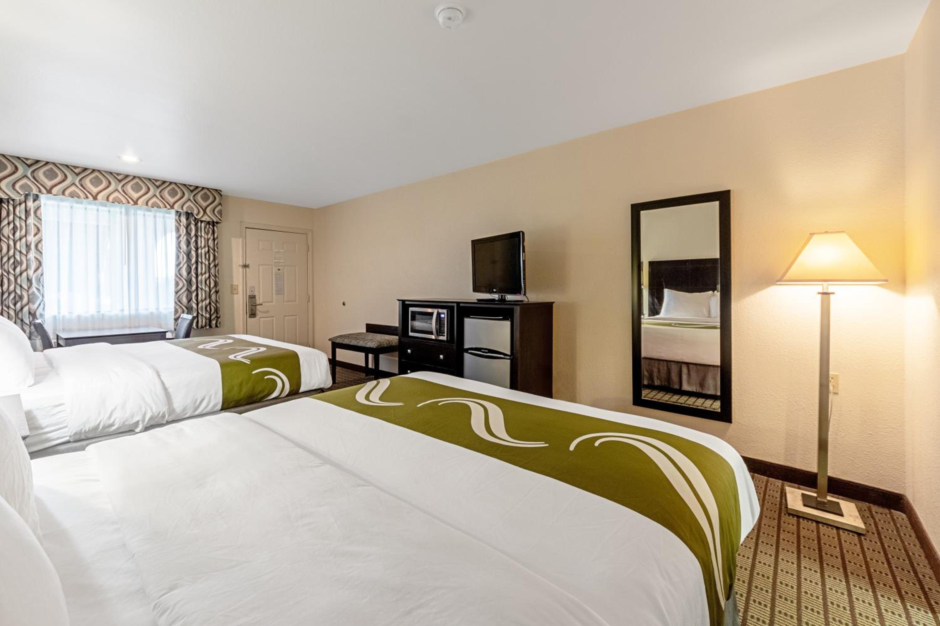 Queen Room with Two Queen Beds - Smoking photo 1