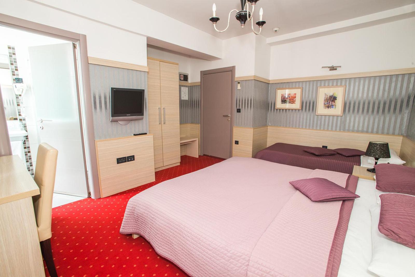 Deluxe Triple Room - Photo 6