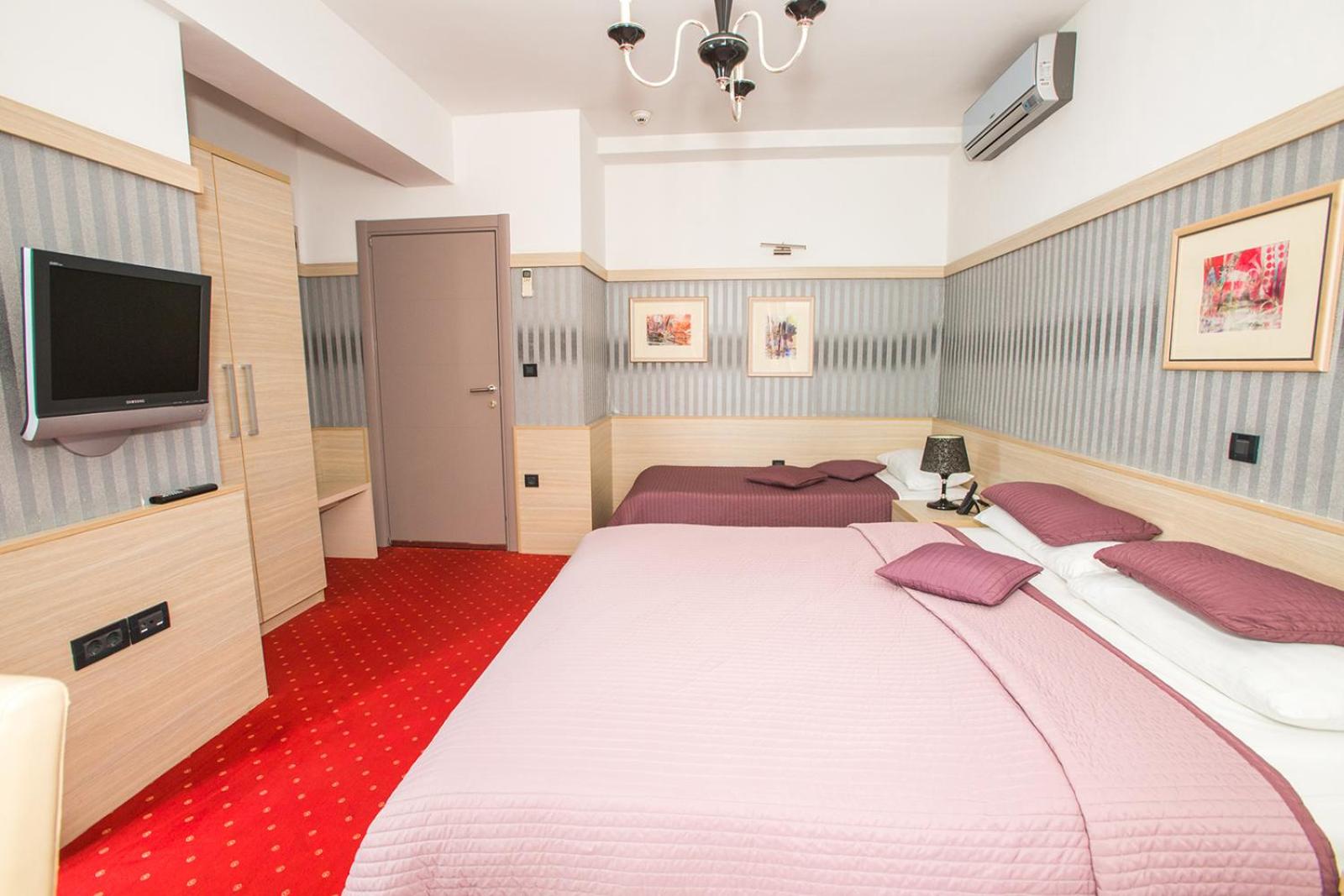 Deluxe Triple Room - Photo 7