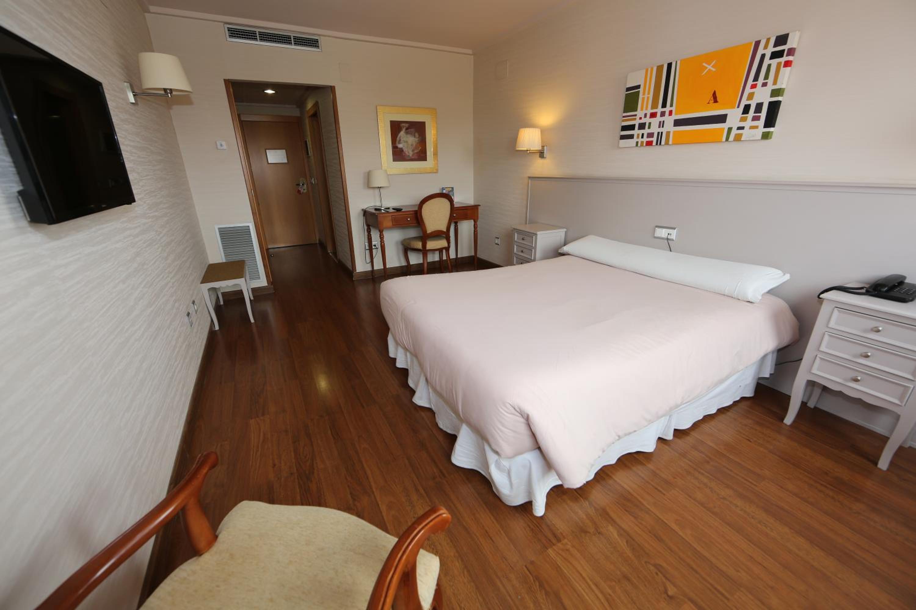 Habitación doble con estacionamiento incluido