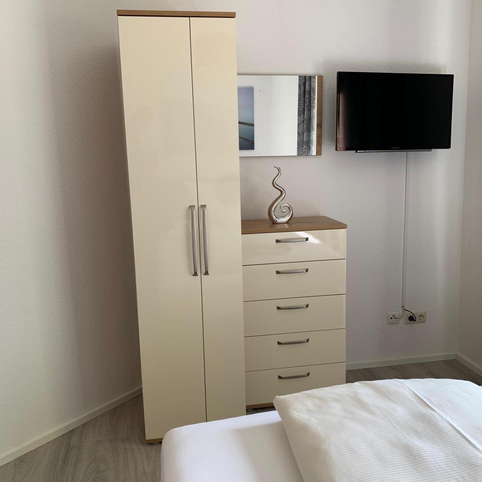 Three-Bedroom Apartment - Photo 18