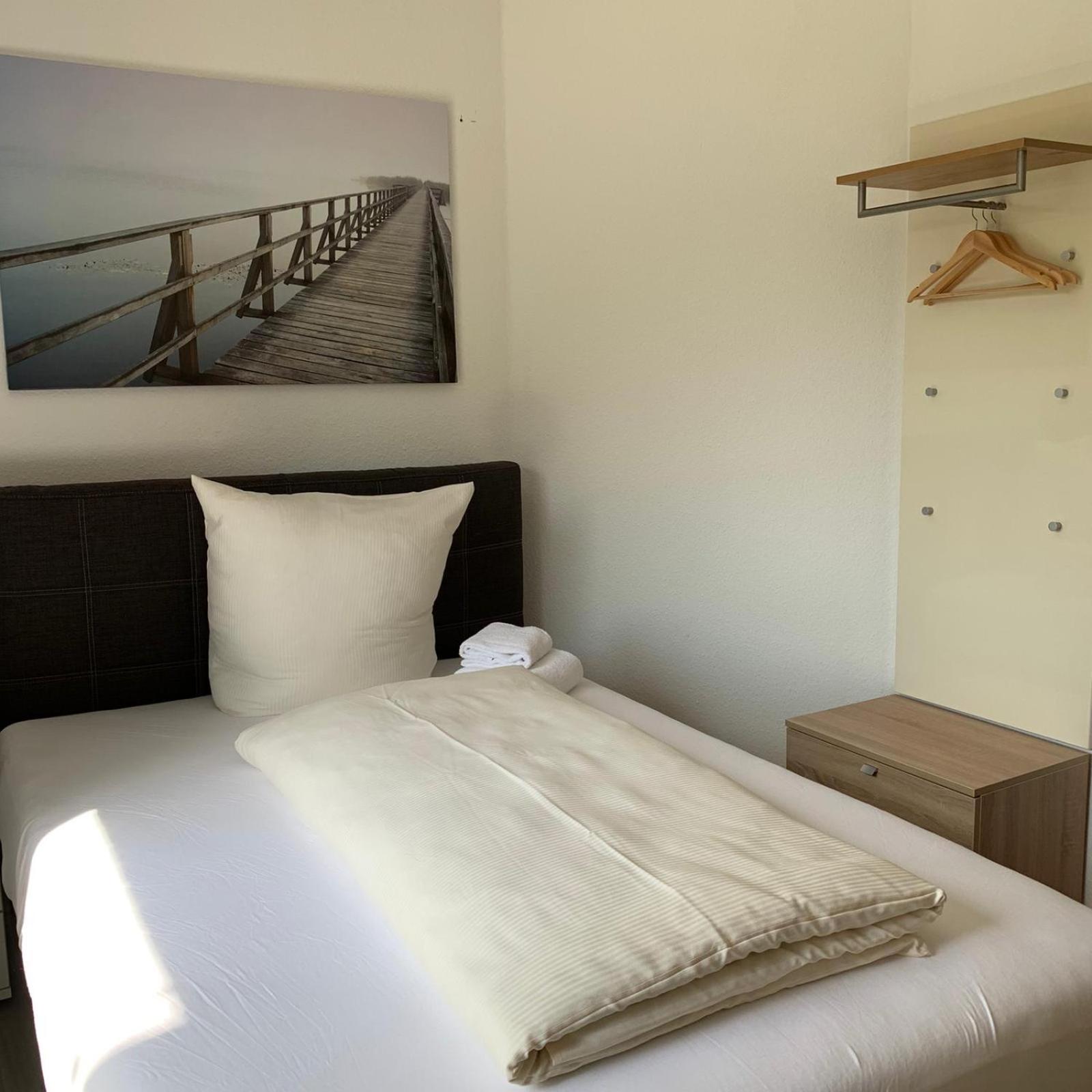 Three-Bedroom Apartment - Photo 19