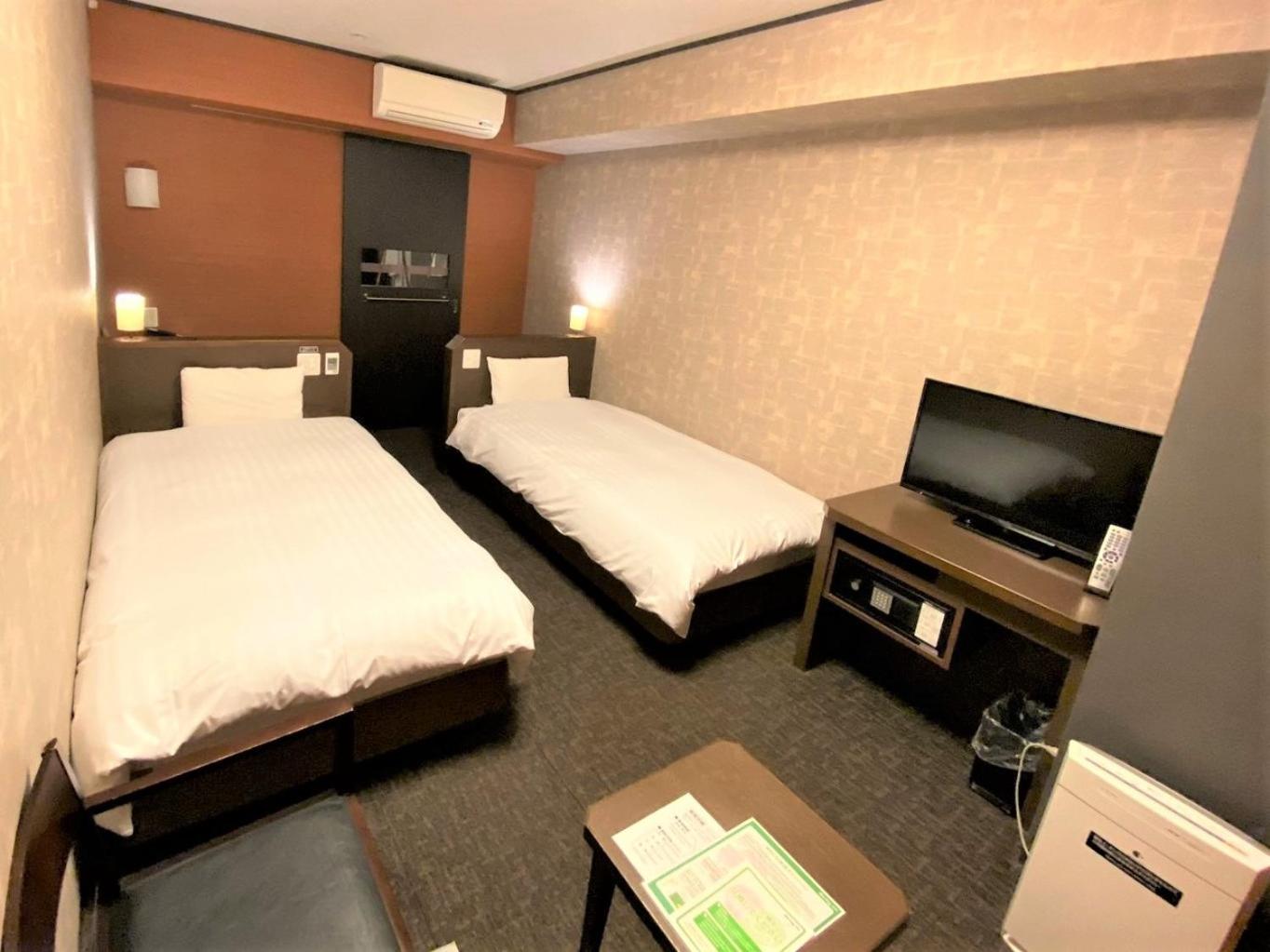 Twin Room - Non-Smoking - Photo 1