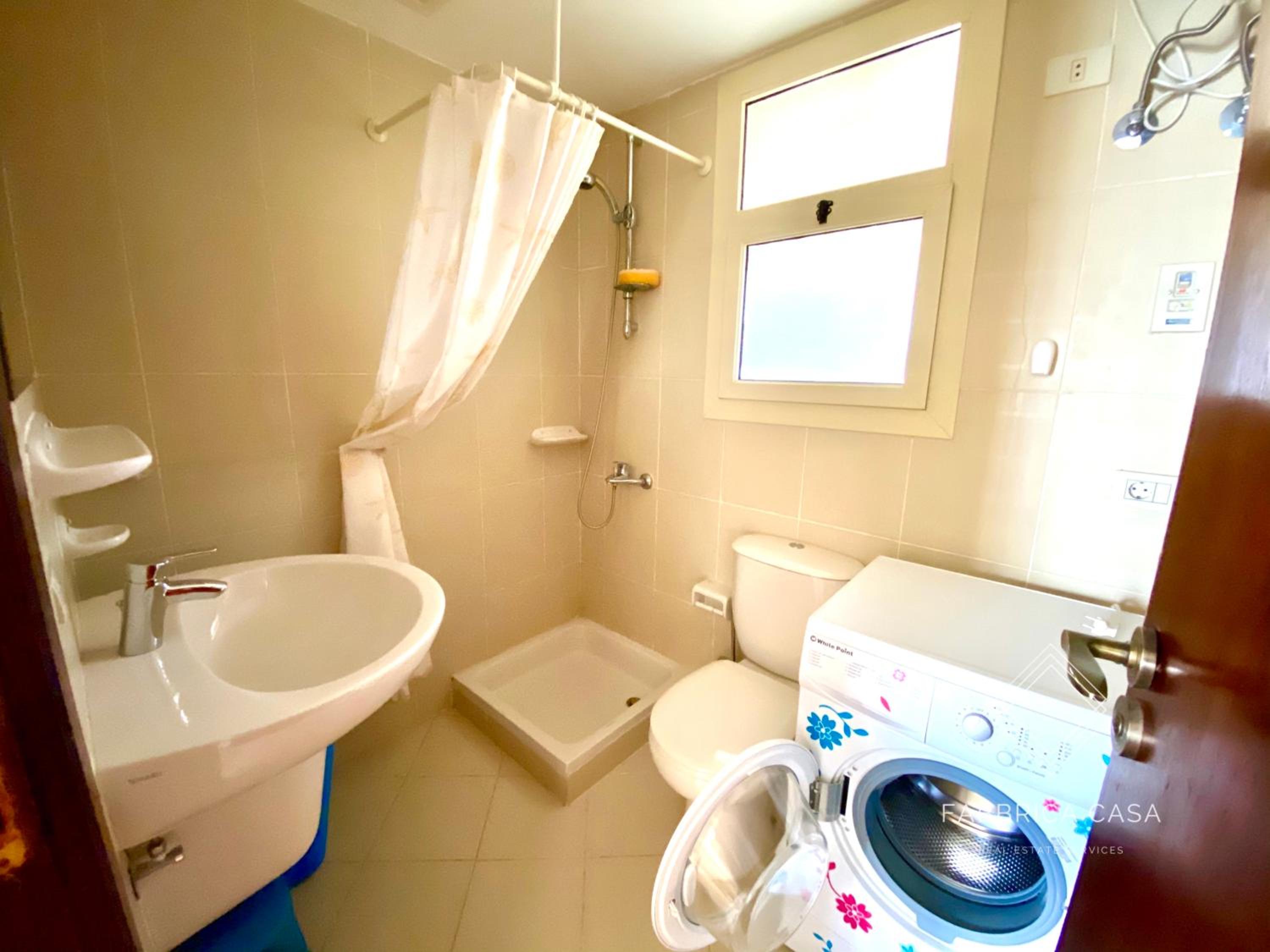 Three-Bedroom Apartment - Photo 2