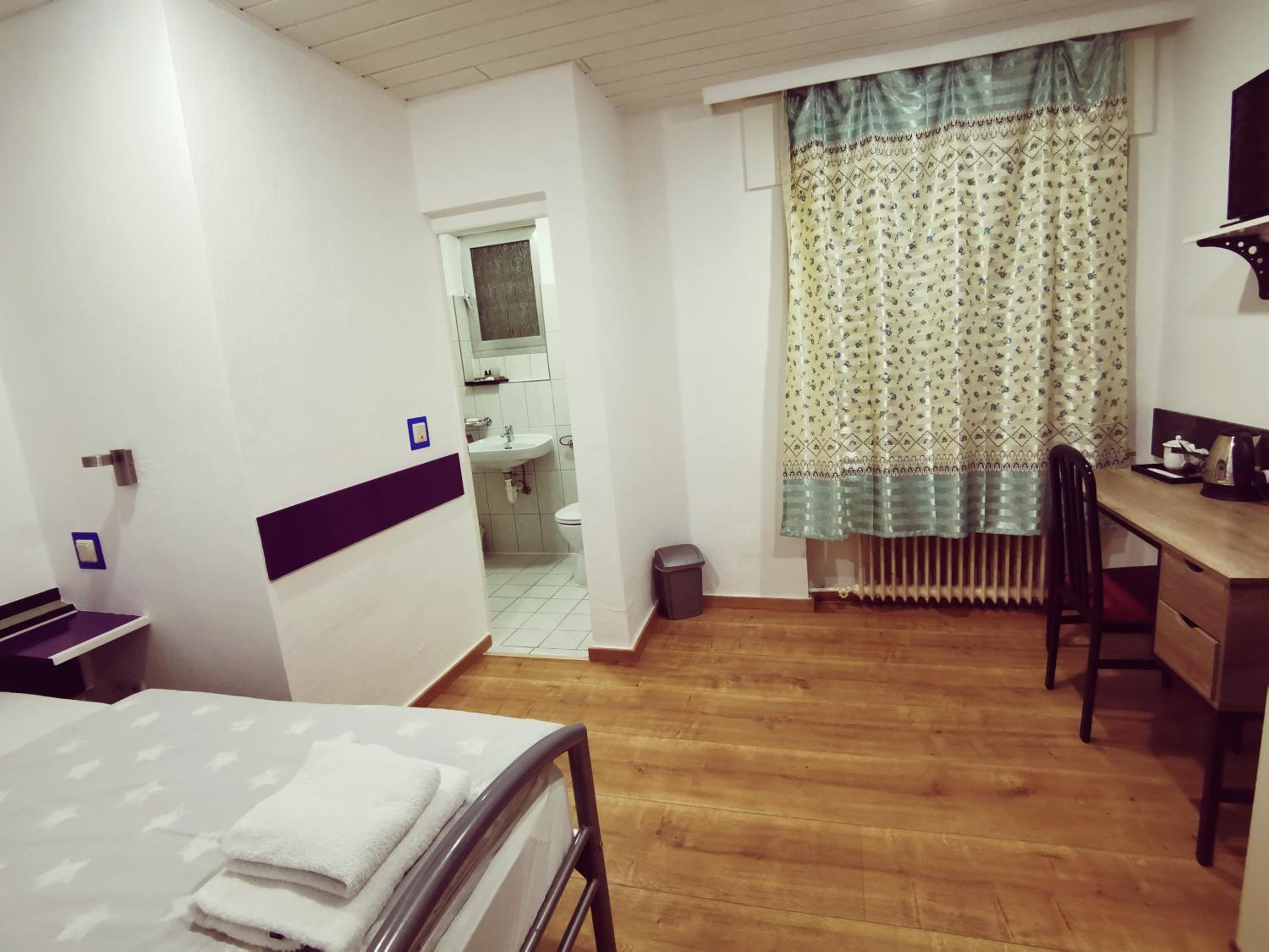 Standard Single Room with Shower photo 2