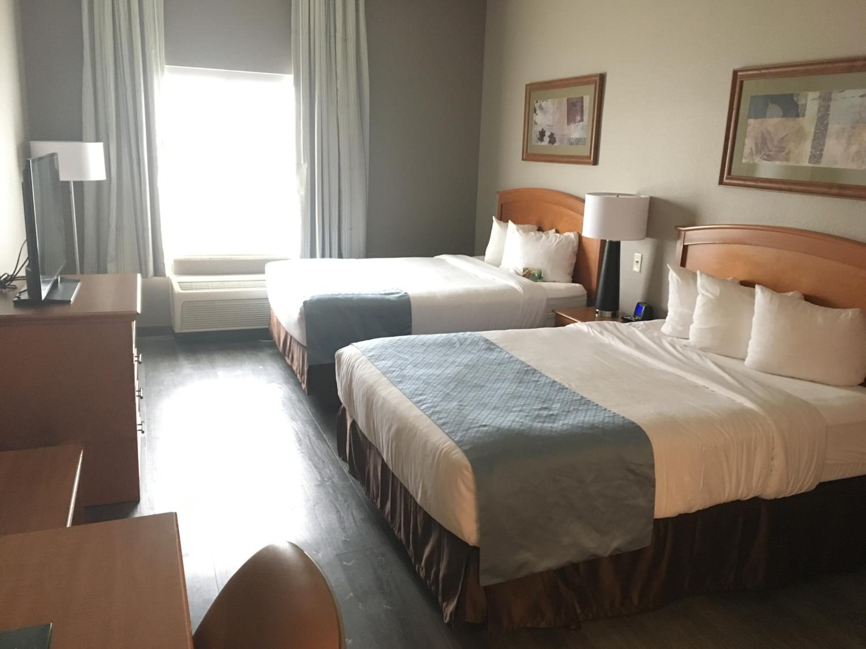 Queen Room with Two Queen Beds - Non-Smoking - Photo 1