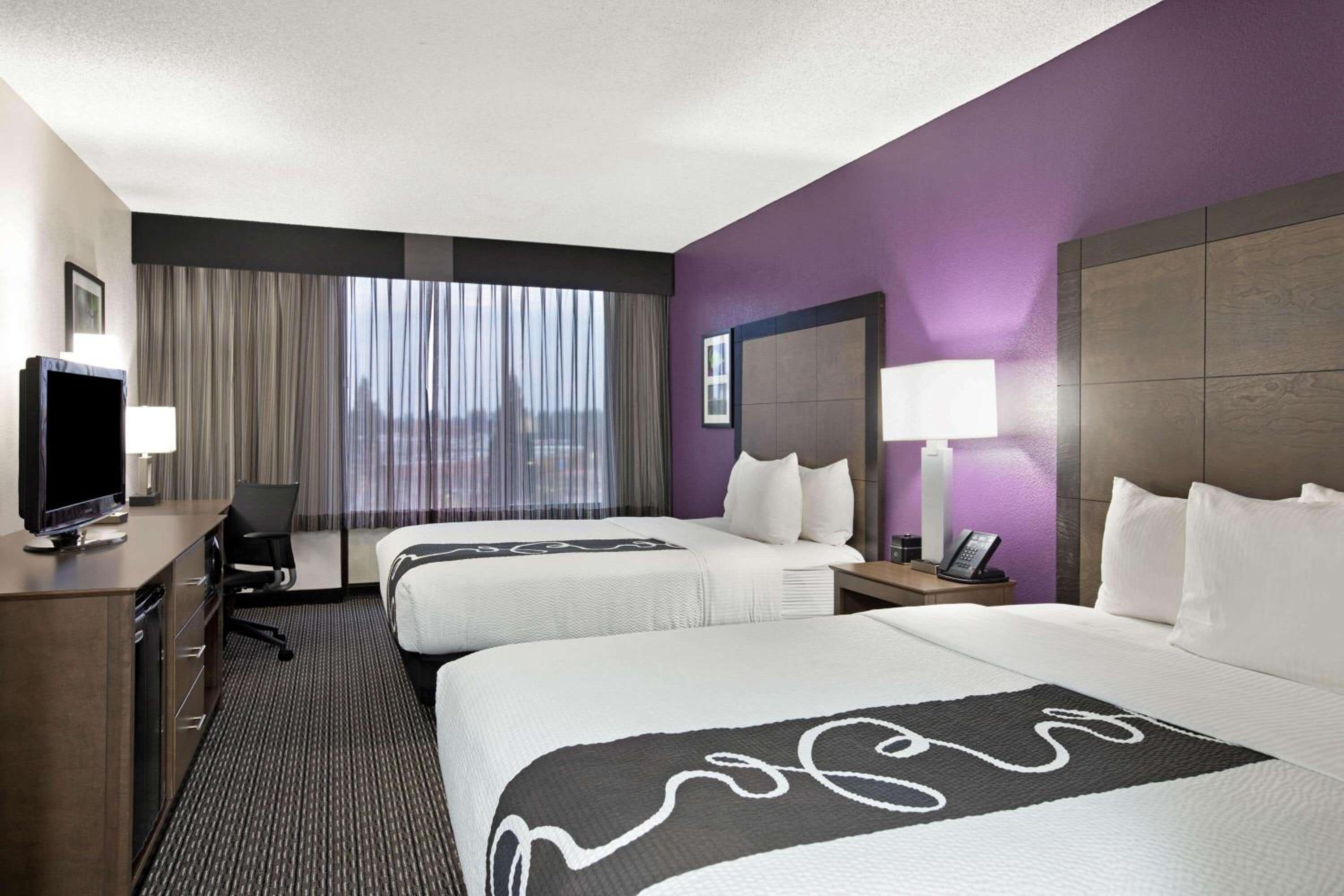 Deluxe Room with Two Queen Beds - Photo 1