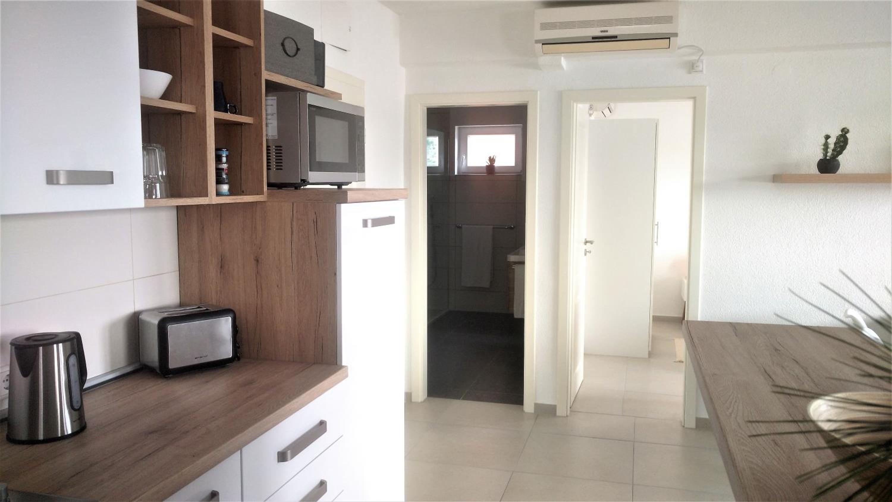 Deluxe Double Room with Balcony and Sea View - Photo 12