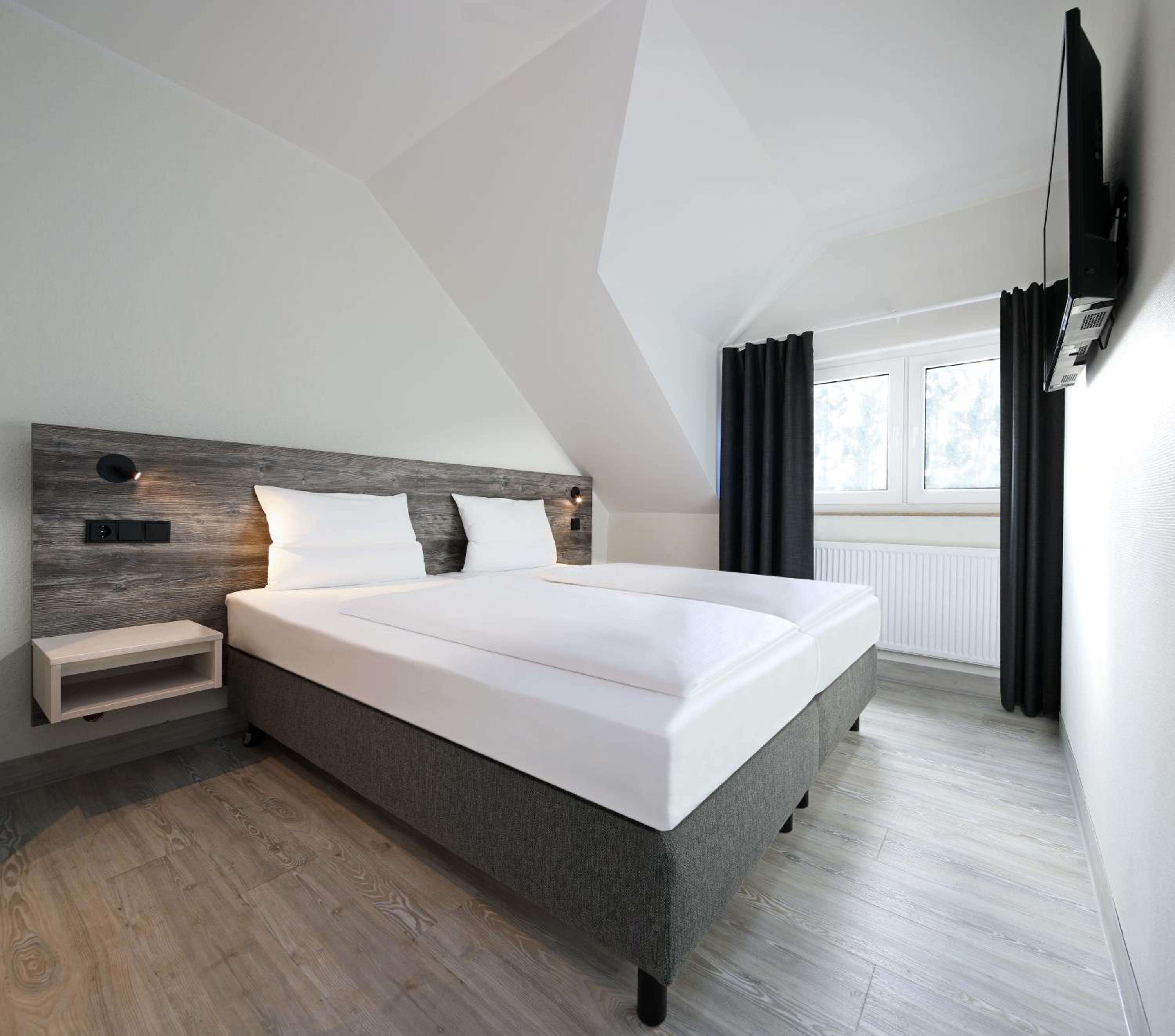 Three-Bedroom House - Photo 18