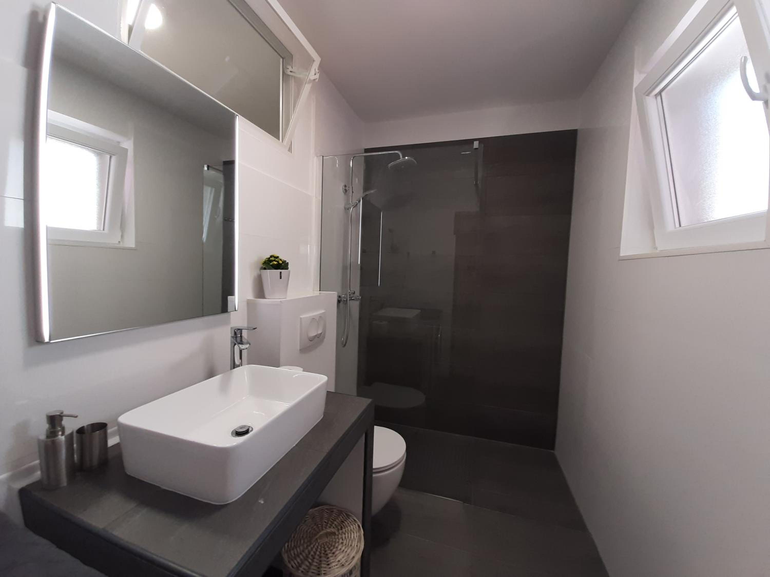 Three-Bedroom Apartment - Photo 25