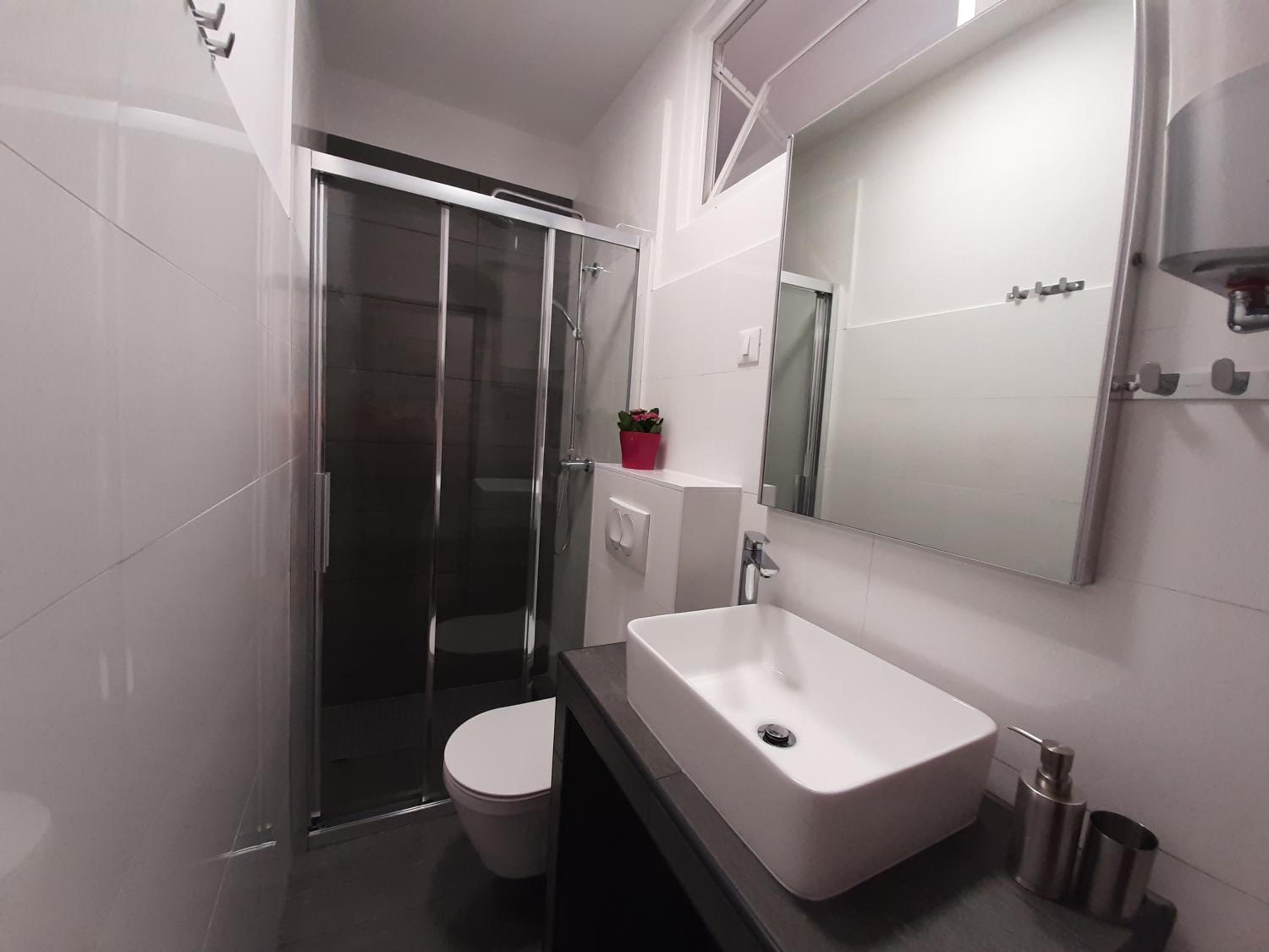 Three-Bedroom Apartment - Photo 26