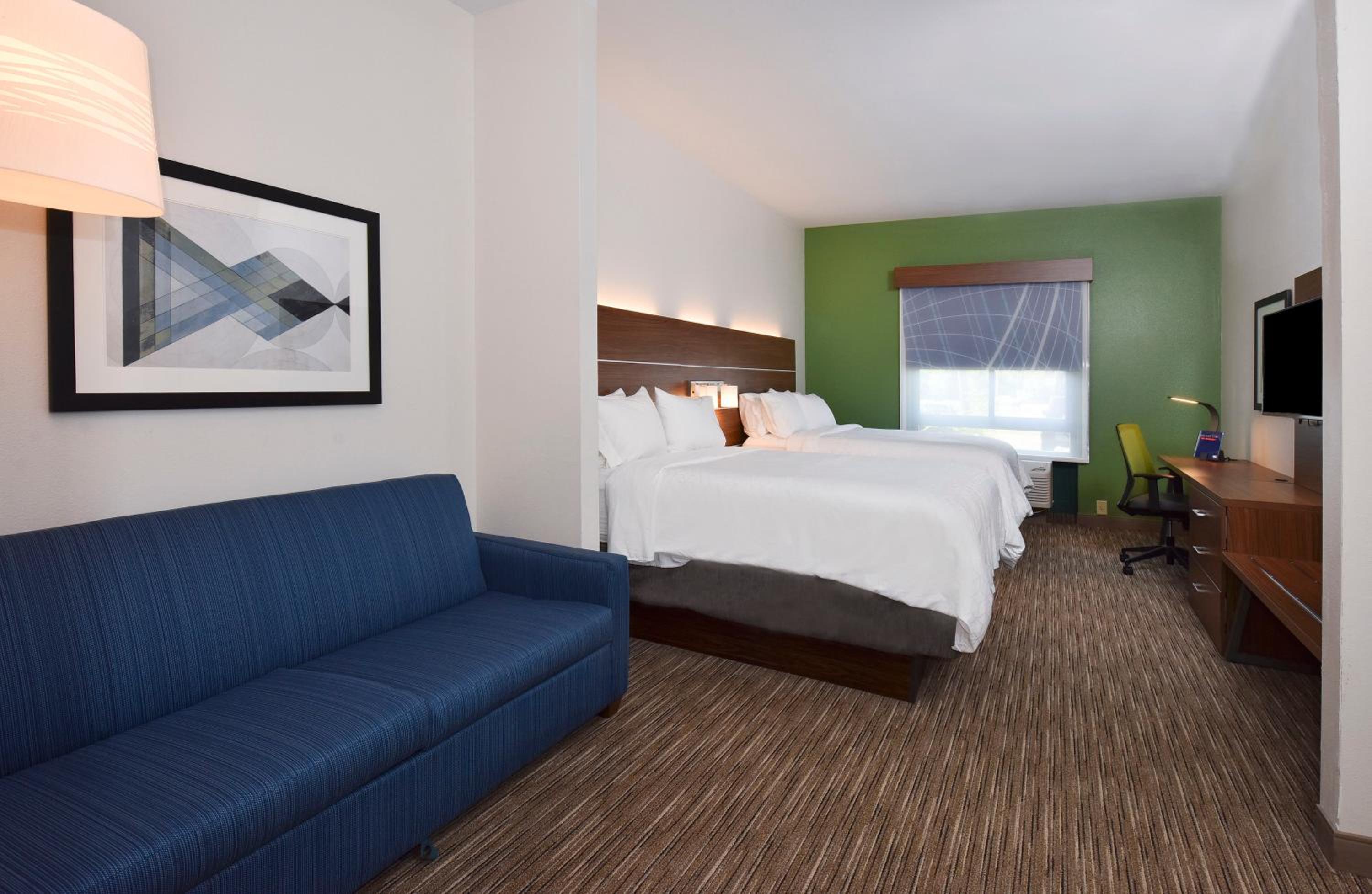 Queen Suite with Two Queen Beds and Additional Living Area - Photo 1