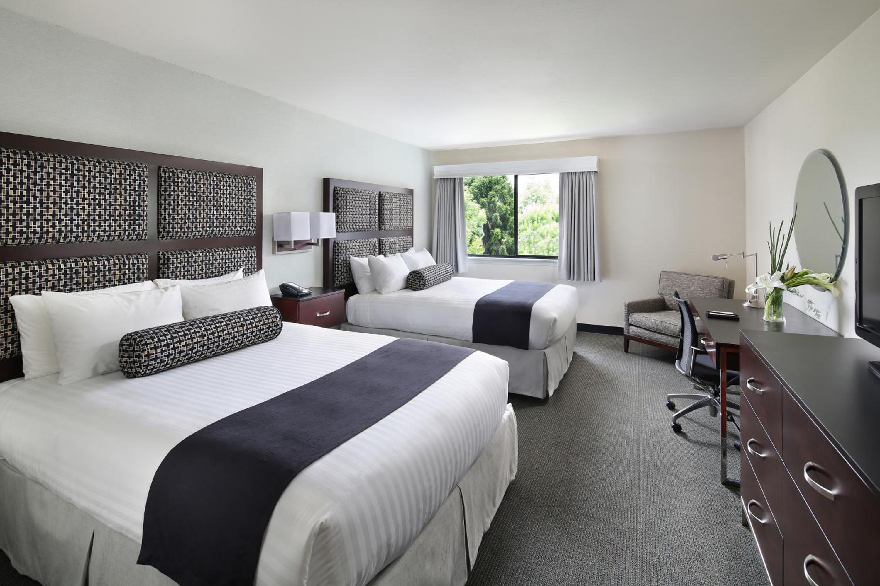 Deluxe Queen Room with Two Queen Beds - Photo 1
