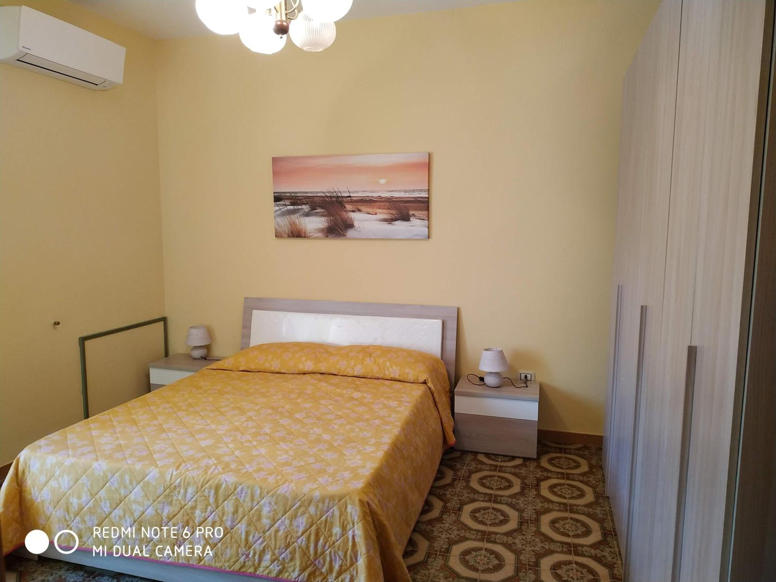 Three-Bedroom House - Photo 32