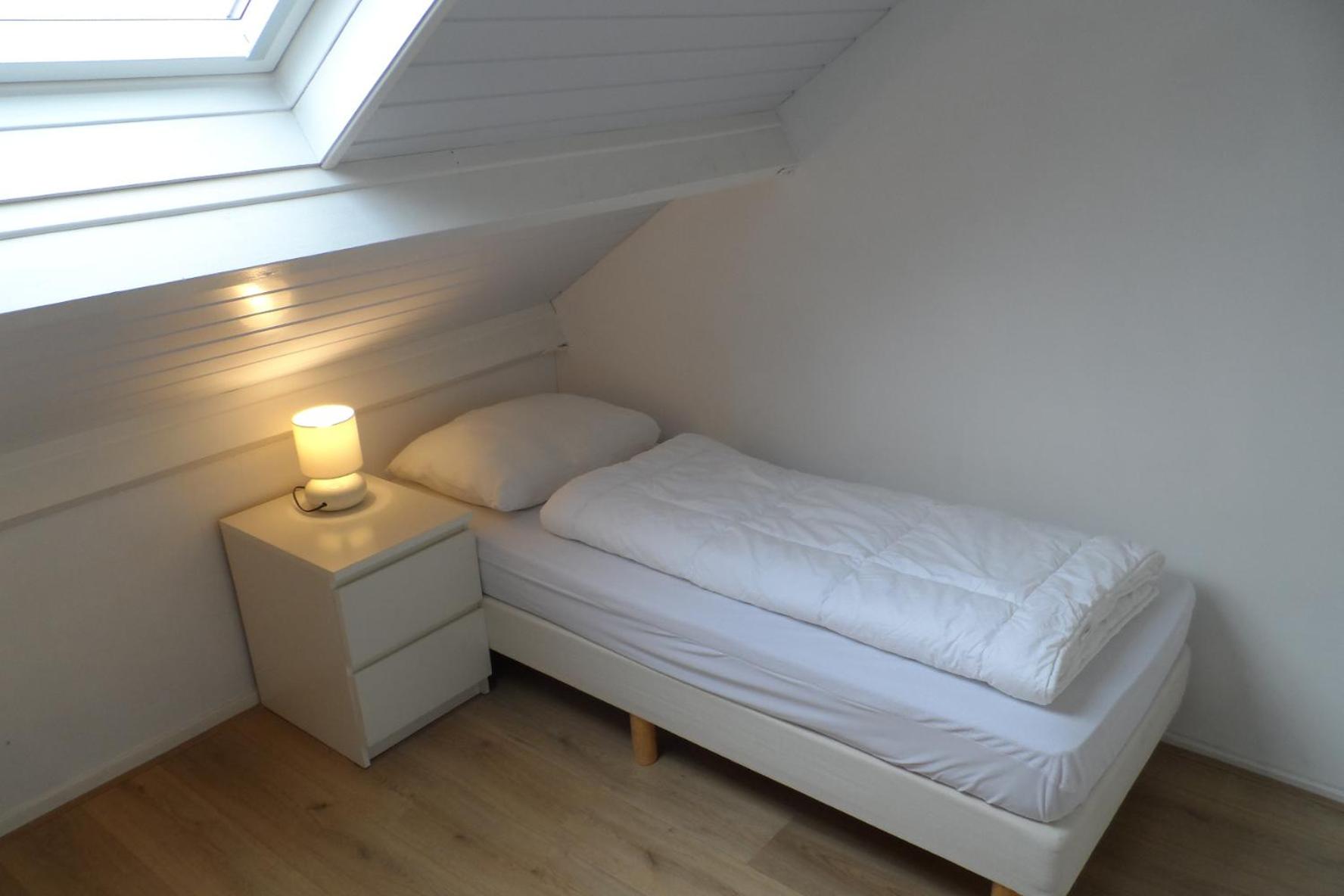 Three-Bedroom Apartment - Photo 15