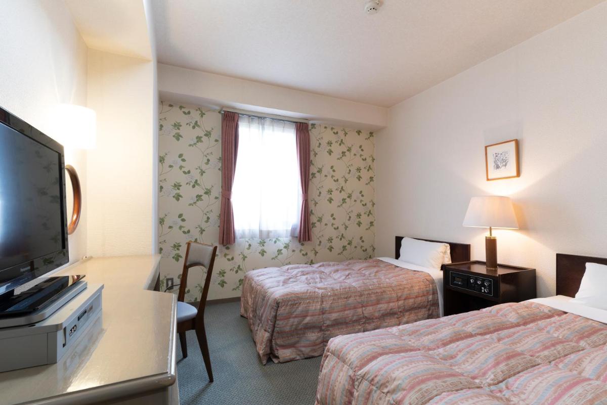 Twin Room - Non-Smoking photo 1