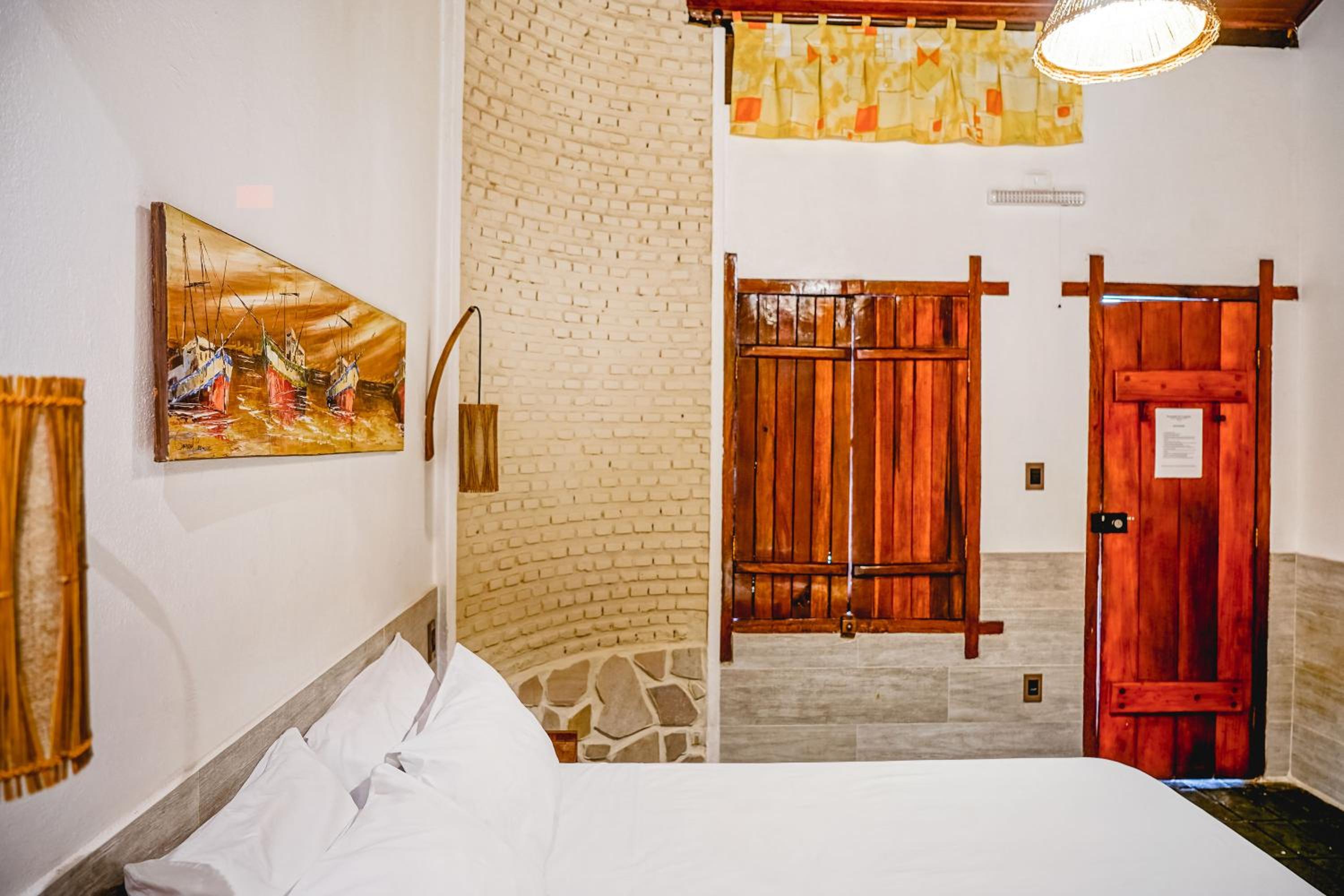 Double or Twin Room with Balcony and Garden View photo 1