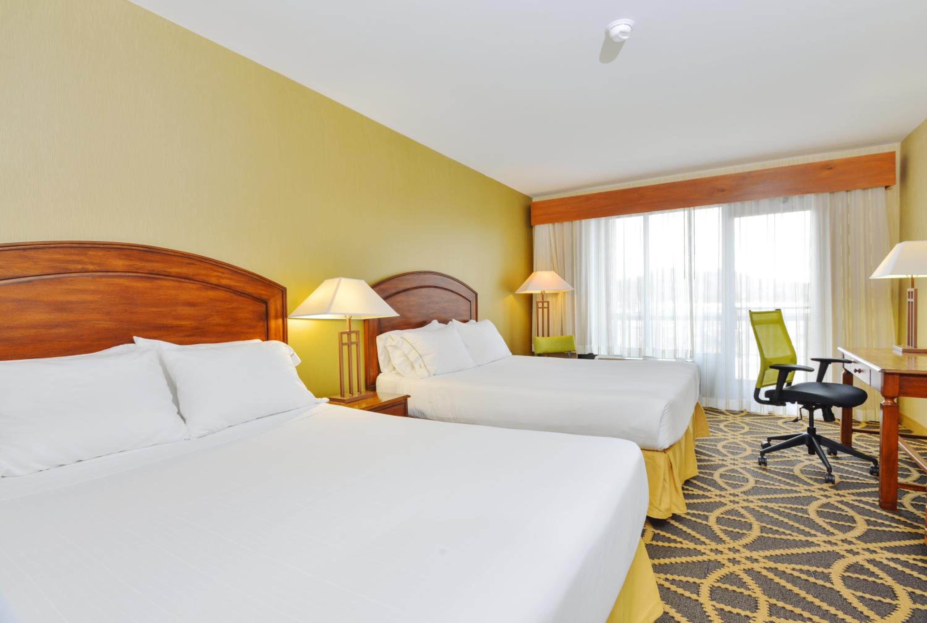 Standard Queen Room with Two Queen Beds and Balcony - Photo 1