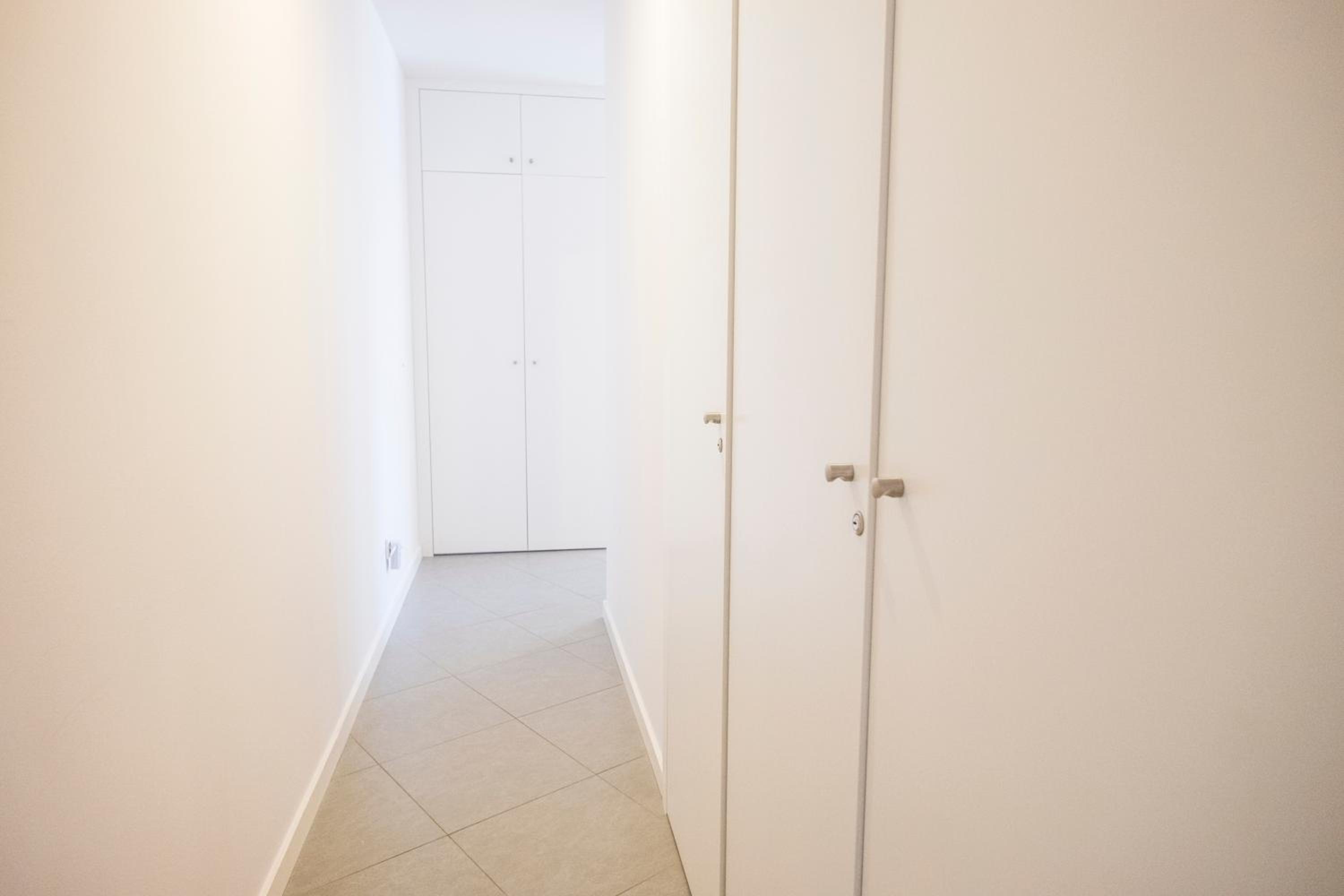 Three-Bedroom Apartment - Photo 11
