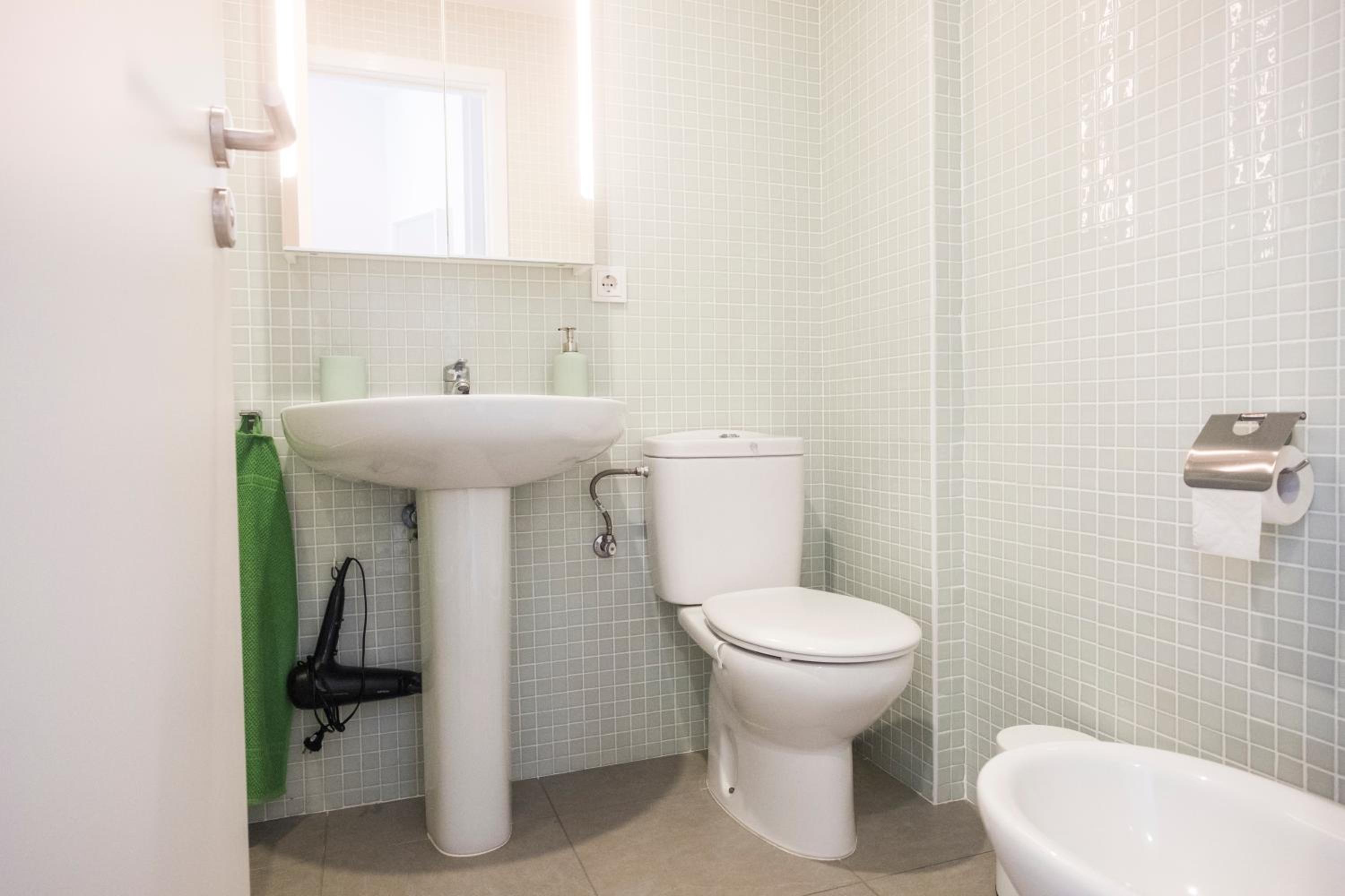 Three-Bedroom Apartment - Photo 12