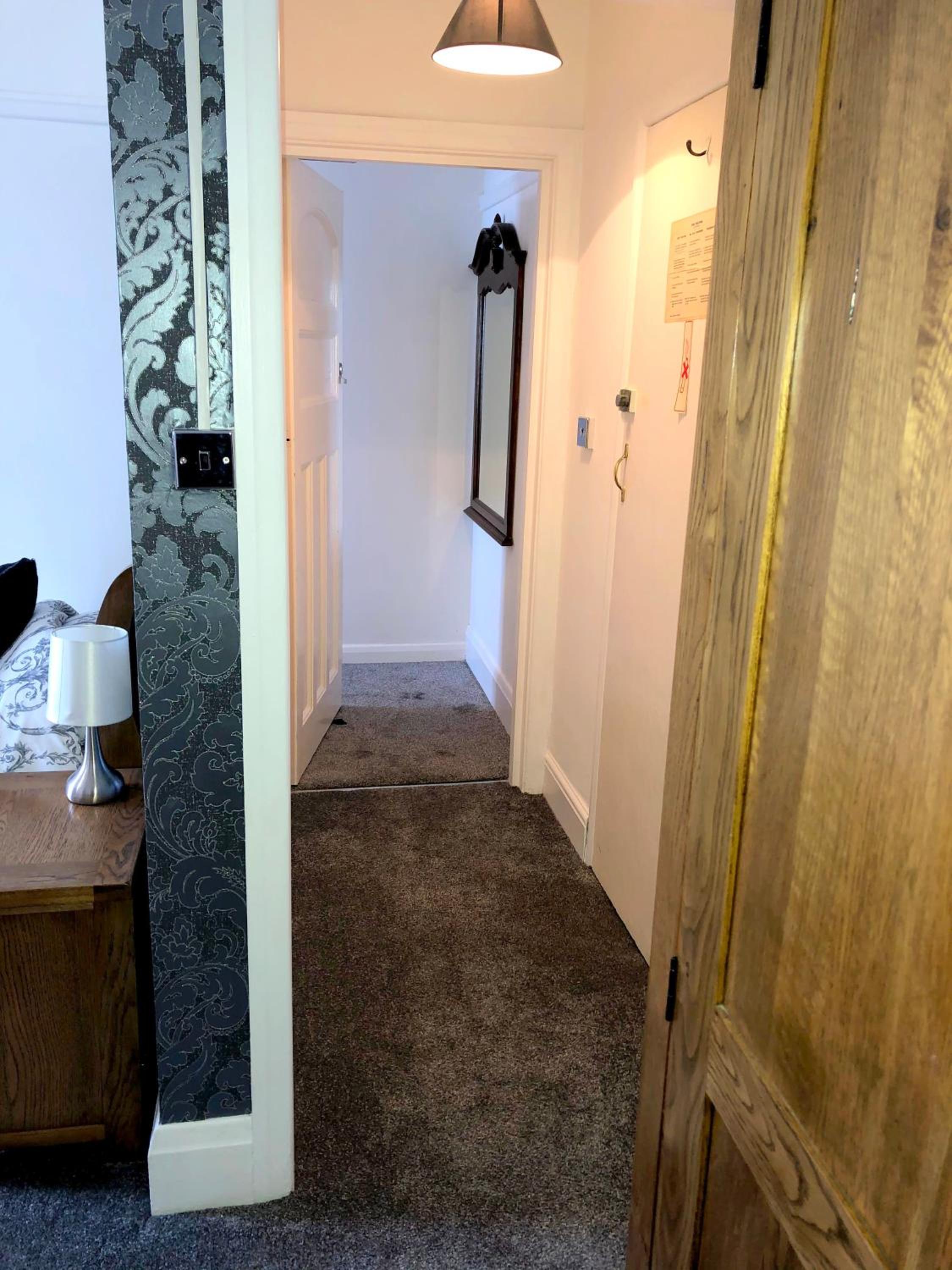 Deluxe Quadruple Room - Photo 11