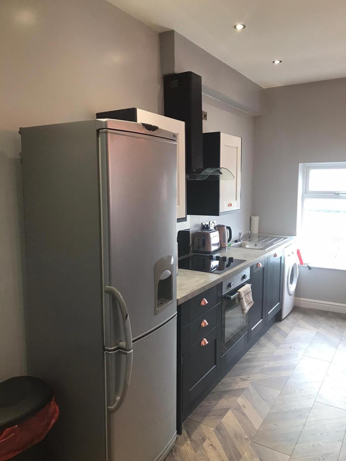 Three-Bedroom Apartment - Photo 4