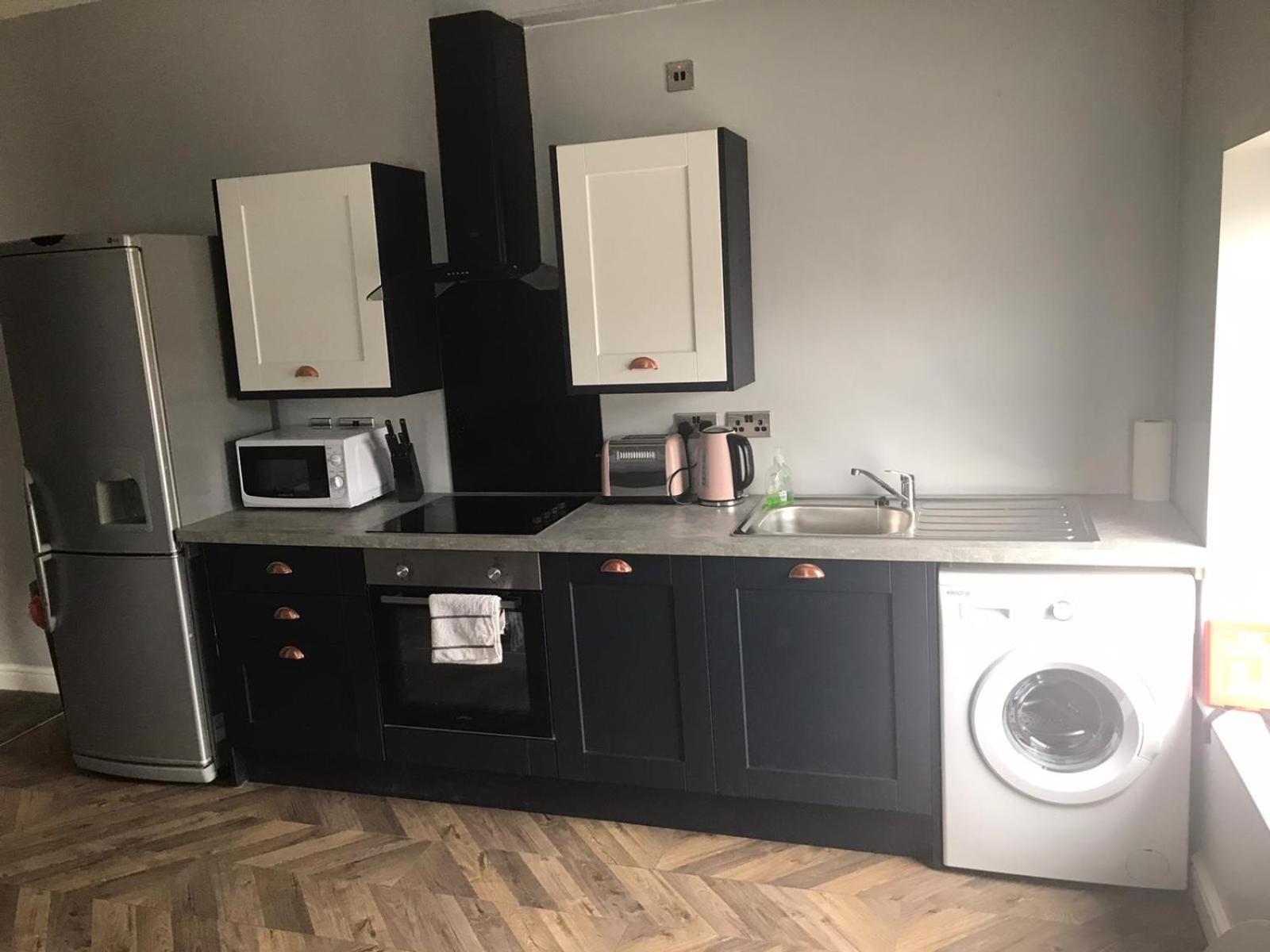 Three-Bedroom Apartment - Photo 9