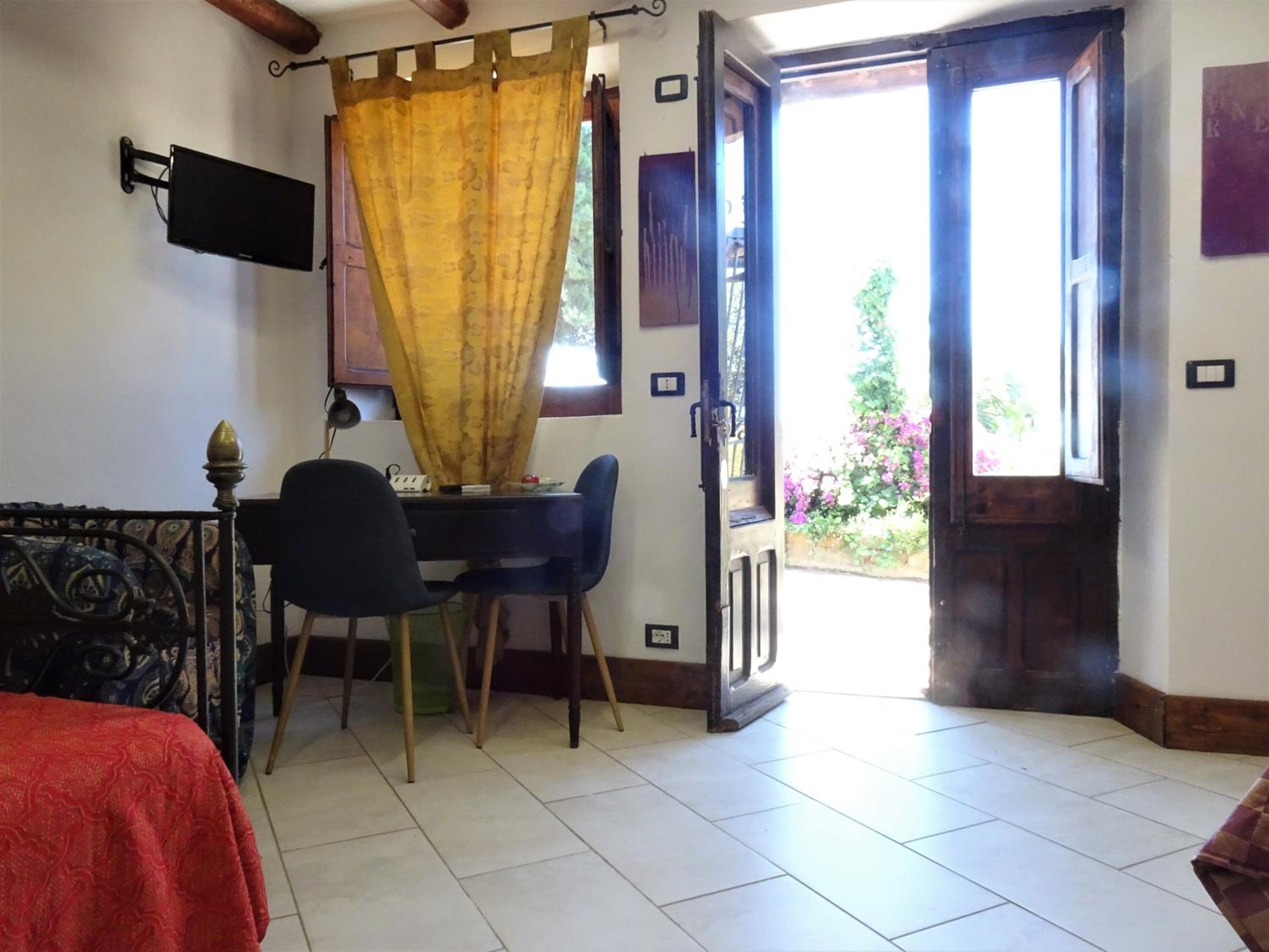 Quadruple Room with Garden View - Photo 14