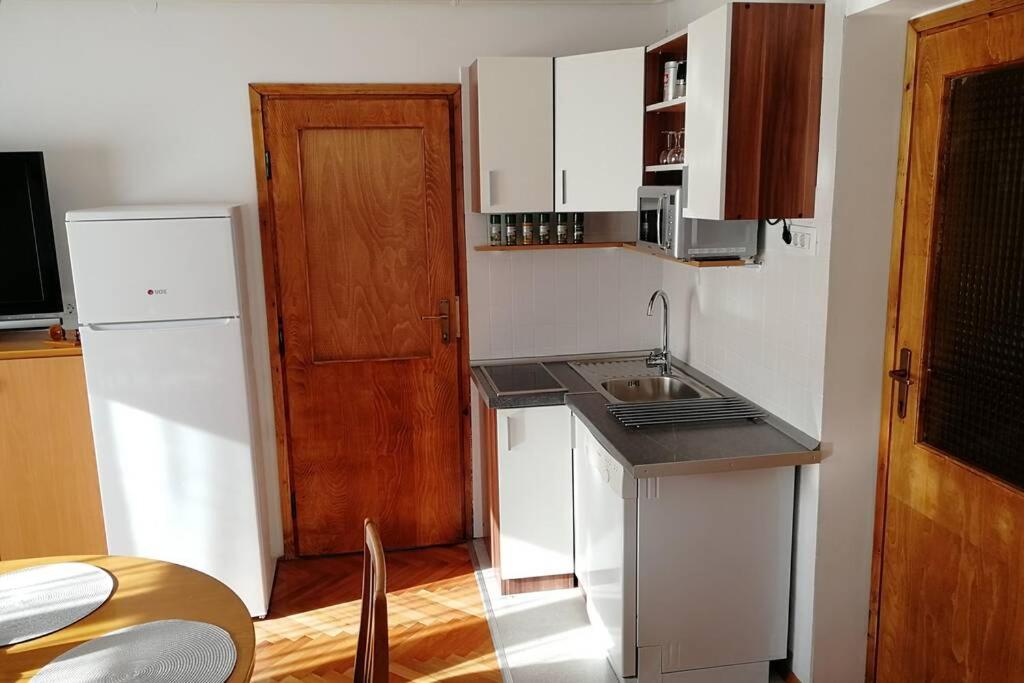 Three-Bedroom Apartment - Photo 11