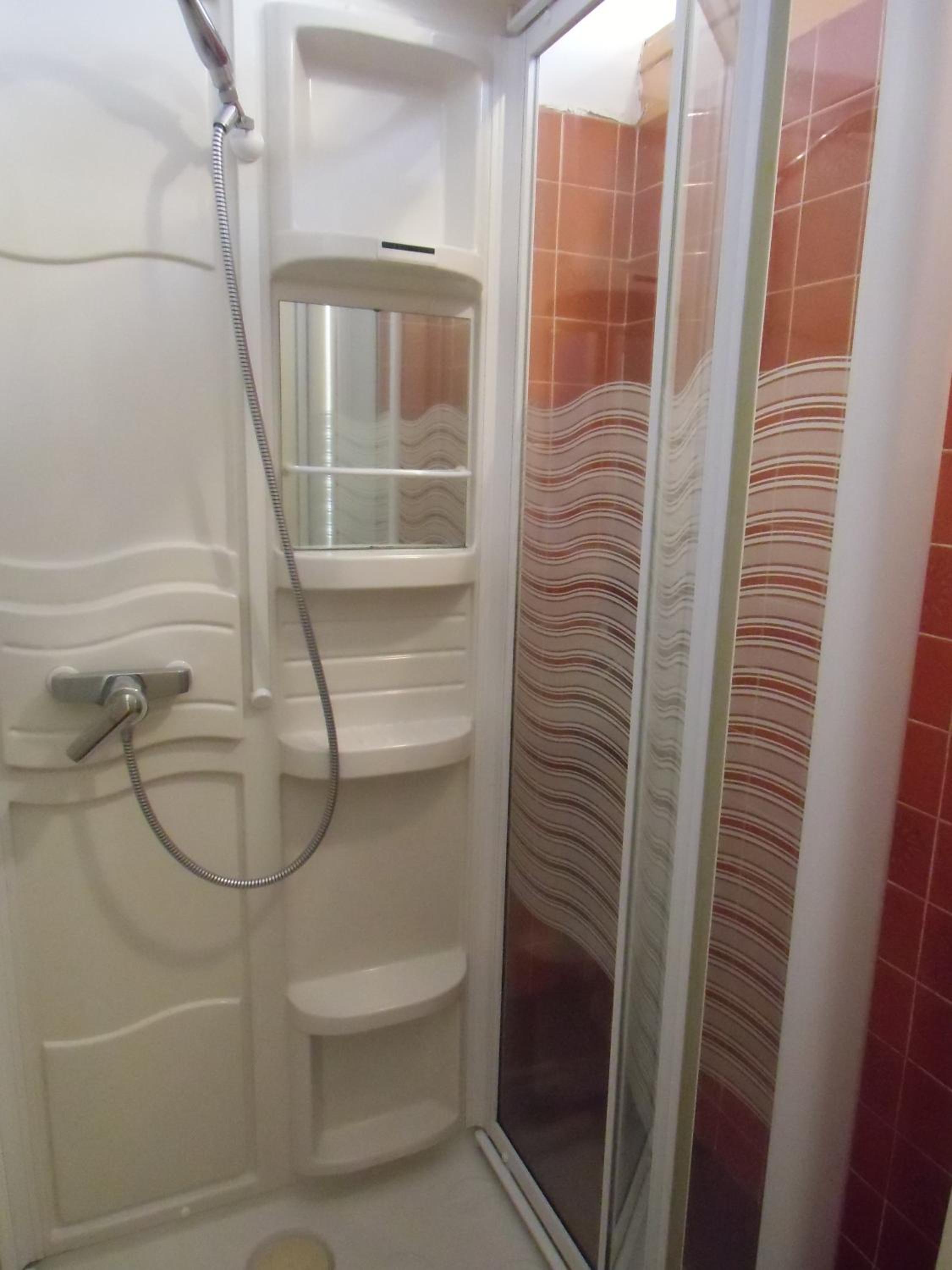 Economy Triple Room With Shared Bathroom photo 2