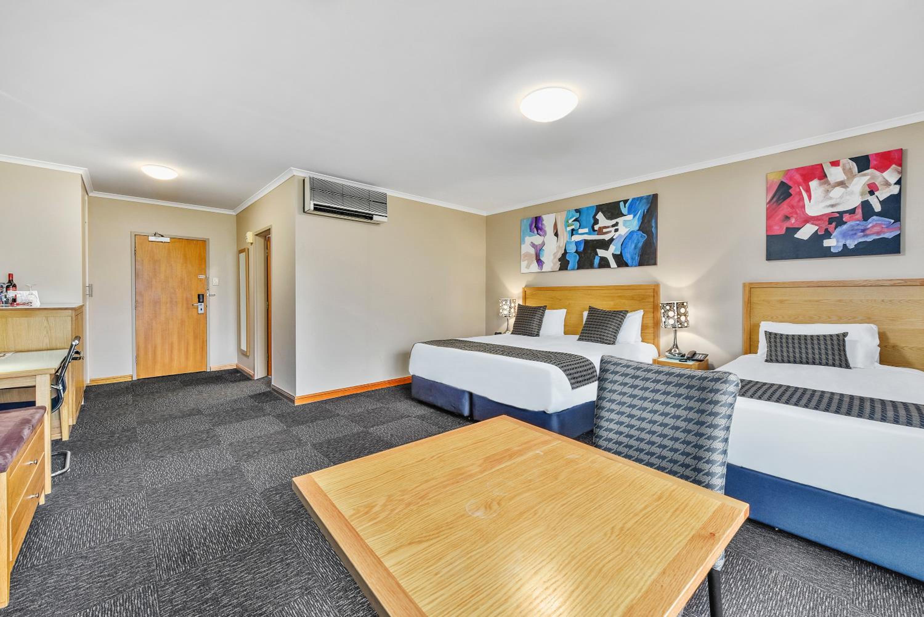 Deluxe Twin Room with King and Single Bed - Photo 3