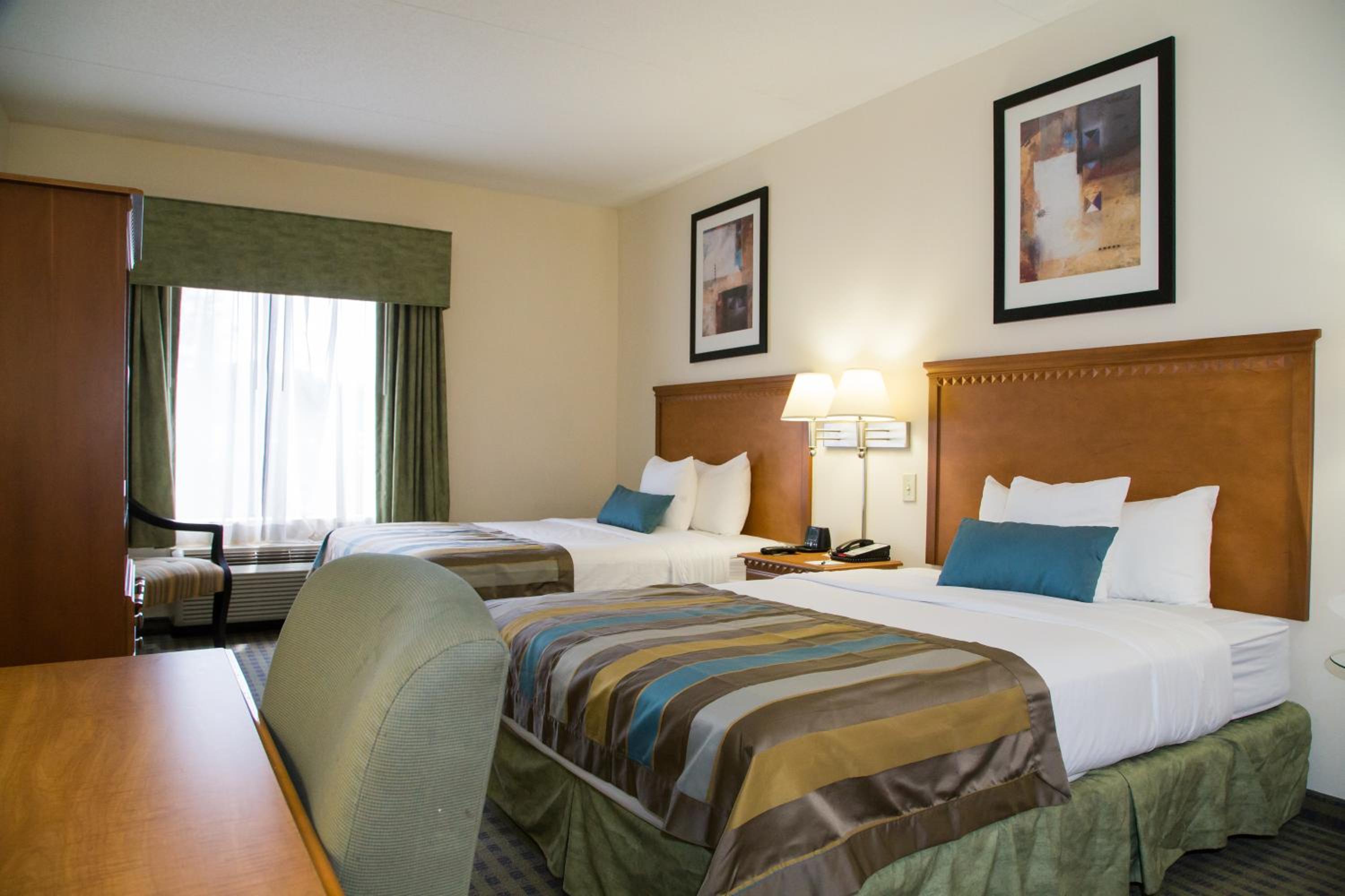 Deluxe Queen Room with Two Queen Beds - Non-Smoking - Photo 1